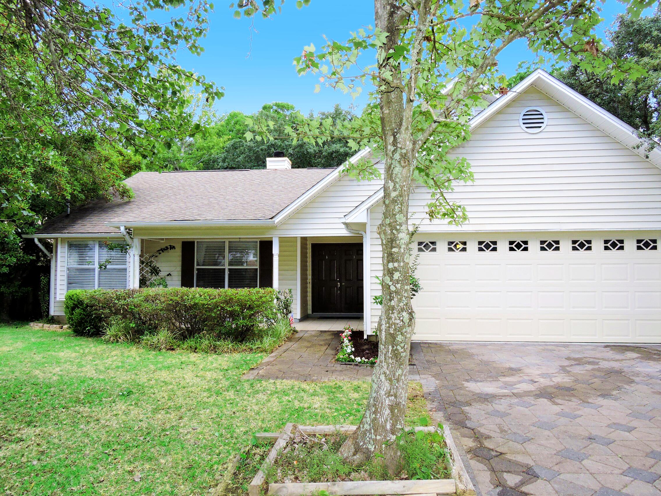 Cute Florida cottage in the heart of West Destin. Great corner lot with a private and beautifully landscaped fenced back yard, perfect for entertaining your friends and family. Super nice open concept floor plan with laminate wood look flooring and soaring ceilings. NO Carpet in the whole home. Kitchen has granite counters, stainless steel appliances, and ceramic tile flooring. Two large dining areas flank the kitchen. The master bedroom is spacious with vaulted ceilings, walk-in closet, and super nice master bath with granite double vanities. Two more spacious bedrooms are on the opposite side of the home which allows for privacy & easy family living. Second bath has a tub/shower combination & a modern vanity. Low maintenance home! HVAC 2017, water heater 2020, roof 2006