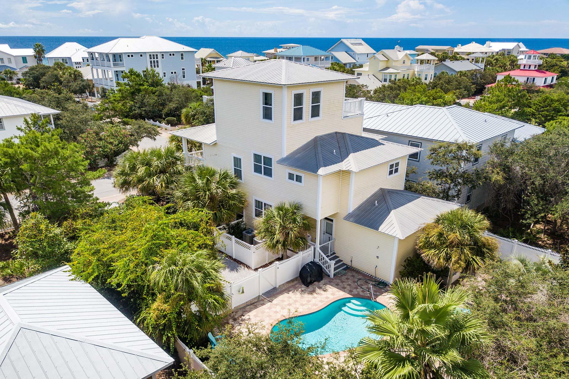 Welcome to Moore Vacations nestled within the exclusive gated enclave of Old Florida Beach! Old Florida Beach offers a charming Americana-styled community in the heart of Santa Rosa Beach close to many of 30-A's most recognized restaurants, boutiques and coastal dune lake treasures. This 4 bedroom, 4.5 bath vacation rental is only steps away from the Gulf of Mexico and offers views from upper level balconies. 12 + fortunate guests can enjoy a lovely lagoon-shaped private swimming pool, outdoor dining, and plenty of comfortable lounge areas. Book your showing today!