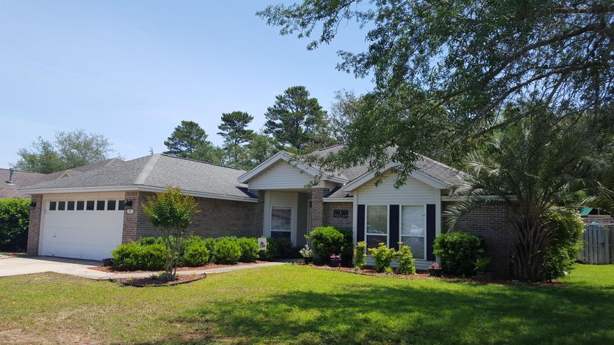 Location, location, location...This awesome home is in wonderful Parkwood Estates, a gated community in Bluewater Bay. A 3 min walk to Bluewater Elementary and you never have to leave the subdivision.The community is nestled between Eglin range and Rocky Bayou State Park and has a path to the bayou to put in kayaks or paddleboards.The house has a wonderful split floor plan with 4 bedrooms and 2 baths. It is bright and open with a large living room, formal dining room and eat in kitchen. PLUS, a lovely heat and cooled florida room with triple slider doors that open to a paver patio and fenced back yard.The kitchen has a breakfast bar, stone back splash, a pantry and plenty of cabinets. There are beautiful wood floors in the formal dining room, which also has a trey ceiling,