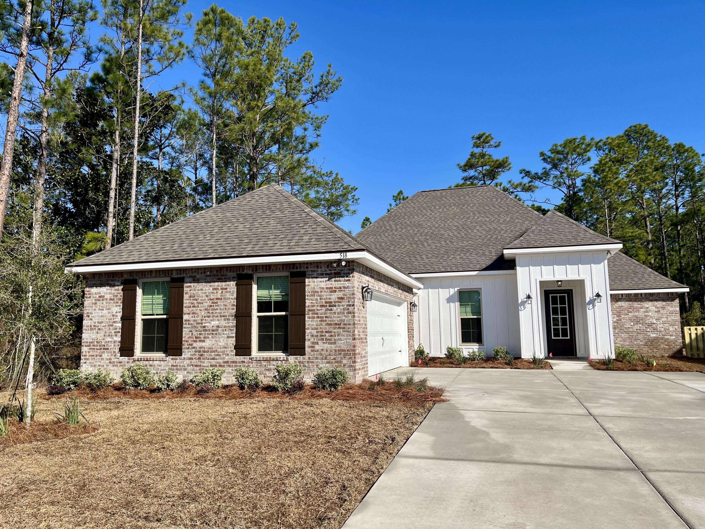 The CLAUDET III G in Bird Song at Hammock Bay community offers a 4BR, 3BA, open design with formal dining and keeping room. Upgrades added (list attached). Features: double vanity, garden tub, separate custom tiled shower, and 2 walk-in closets in master bath, tray ceiling in master bed, en suite bath in bed 2, kitchen island, walk-in pantry, covered porches, crown molding, smart connect WIFI thermostat, smoke/carbon monoxide detectors, landscaping package, architectural 30-year shingles, flood lights, and more!Energy Efficient Features: water heater, kitchen appliance package, vinyl low E windows, & more! Energy Star Partner.
