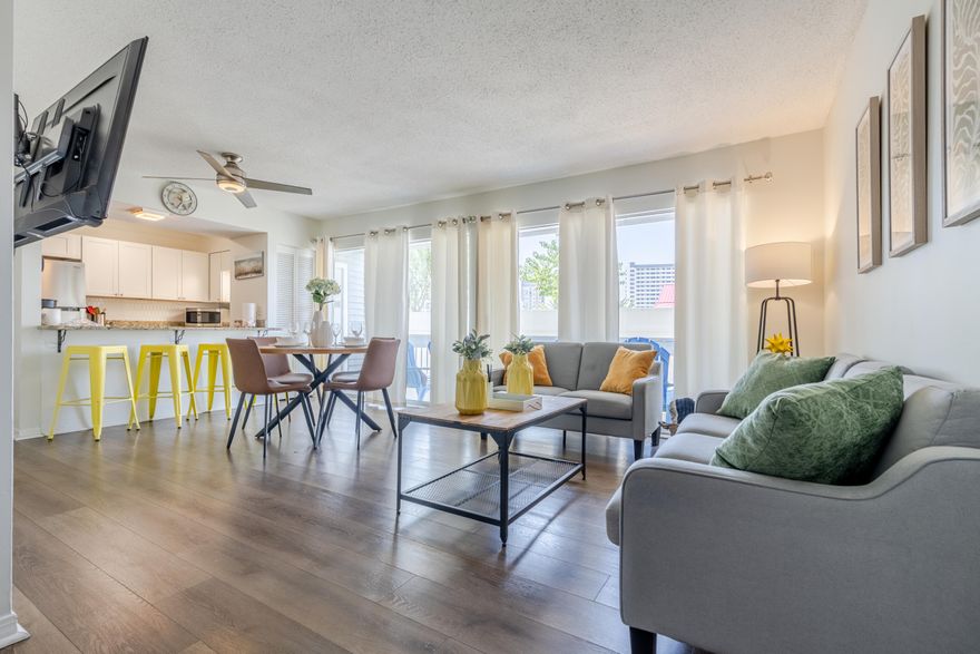 Welcome to Gulf Terrace Unit 189, a beautifully updated gem, 0.8 miles away from public beach access. This turn-key, rental-ready unit has been thoughtfully upgraded and tastefully decorated to capture the essence of coastal living.Noteworthy features include:Luxury Vinyl Plank Flooring: Sleek, waterproof flooring installed throughout for durability and style.Modern Kitchen: Granite countertops, stainless steel appliances, and custom cabinetry make this space as functional as it is elegant.Furniture , furniture package complements the space, paired with charming coastal beach decor.Abundant Natural Light: A large balcony just off the living room invites natural sunlight, creating a warm and inviting atmosphere. Located in the secure, gated community of Gulf Terrace, this property boasts outstanding amenities, including:

Three swimming pools for relaxation and enjoyment.
A tennis court, outdoor grills, and a serene pond with a dock, perfect for unwinding.
Convenience is keythis family-friendly community is just a short walk to popular local spots like Chick-fil-A, Big Kahuna's Water Park, Merlin's Pizza, and Shake's Frozen Custard.

Whether you're seeking an income-producing property or your personal slice of paradise, Unit 189 offers the perfect combination of location, luxury, and lifestyle.

Don't miss this opportunityschedule your showing today!