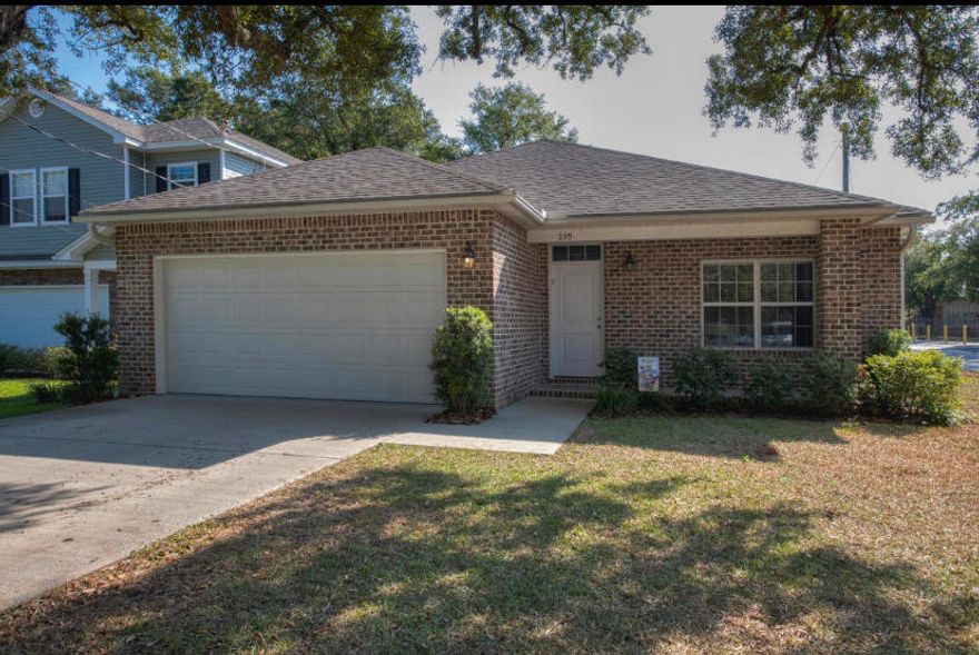 New construction in Niceville featuring quartz countertops, LVP flooring, crown moulding, brick or stone accents with low maintenance vinyl siding. Fenced backyard with sprinkler system and lush landscaping.