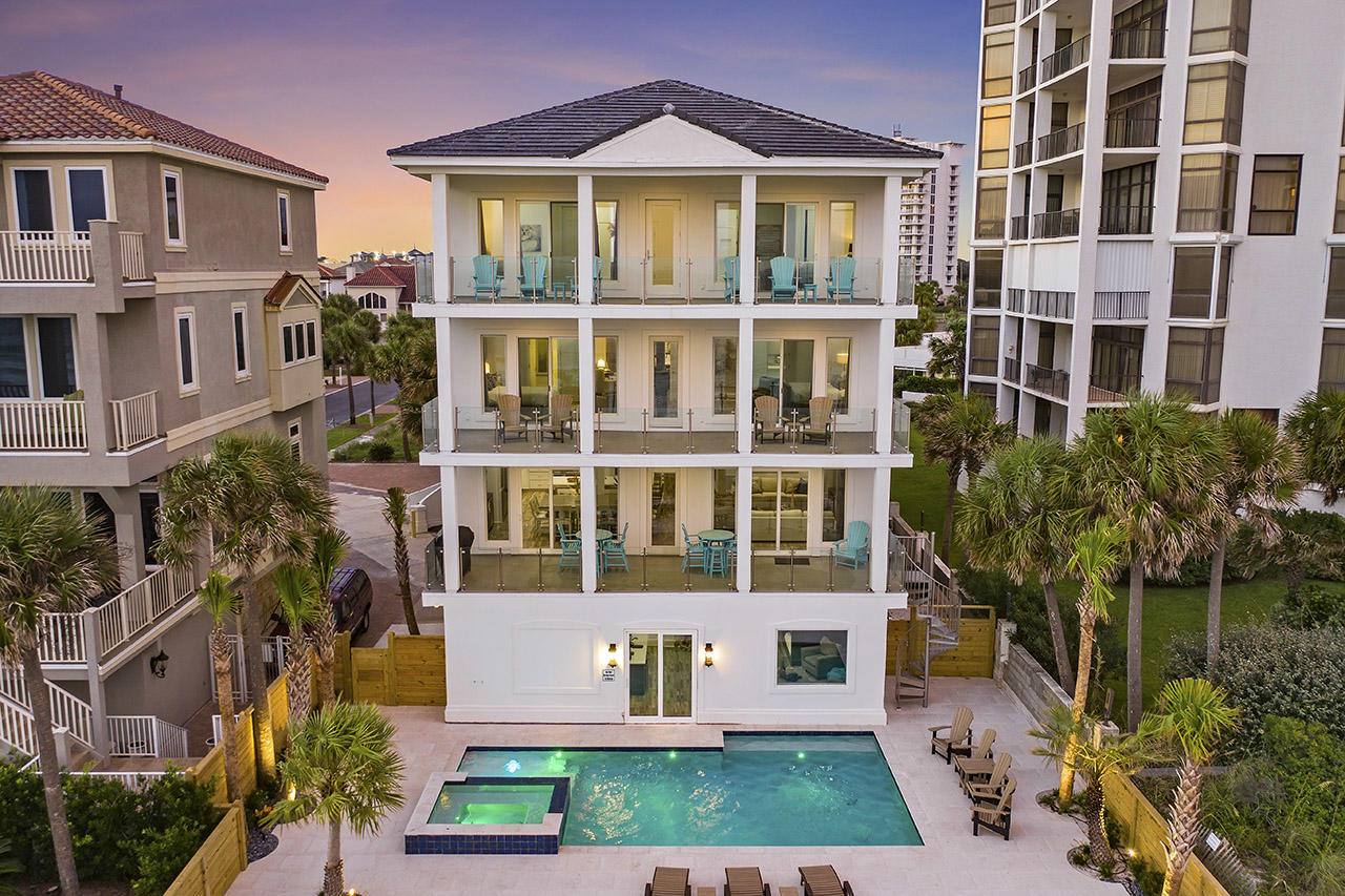 When the owners of this spectacular Gulf front retreat named if after one of Jimmy Buffett's songs, ''Semi True Story,'' they were locking on to one of the best lines of the song, as this house runs all the way to the sea. From its recent and complete renovation to its Gulf front pool and spa, Semi True Story is a true Gulf front masterpiece. It boasts over $570,000 in gross revenue YTD for 2021 and over $600,000 for 2022. It features a new roof, stucco cladding, new windows & doors, new HVAC, flooring, kitchen and baths and a one of a kind custom built bunkroom suite that accommodates more than 12 guests. Sitting directly on the Gulf in the gated community of Dunes of Destin, Semi True Story affords breathtaking views of the water...