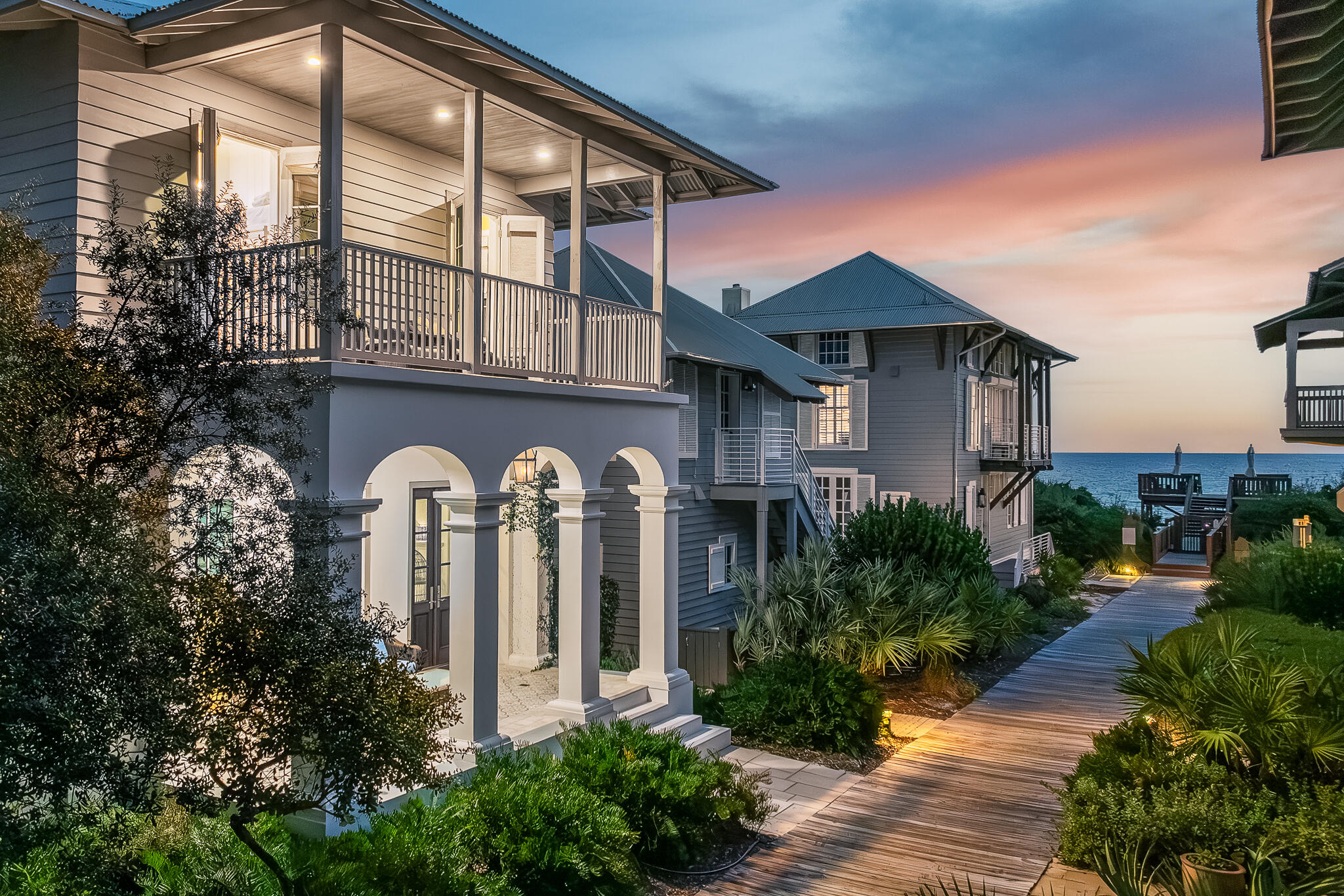 One lot off the gulf on the peaceful eastern side of Rosemary Beach you'll find this exquisite 3BR/3.5BA coastal gem. 14 Atwoods Lane offers a serene retreat with incredible gulf views just steps from the beach walkover. This home was meticulously crafted by builder Chris Ritchie, and then renovated by acclaimed architect Darrell Russell of A BOHEME Design, harmonizing its classic charm with modern luxury.As you step onto the front porch, the boardwalk stretches invitingly before you, leading directly to the pristine gulf waters. Inside, the first floor captivates with its tall ceilings, crown molding, and warm hardwood floors that flow seamlessly throughout the main living areas. The spacious living room is bathed in natural light and offers ample seating for gatherings or quiet relaxation. The gourmet kitchen is a culinary dream, featuring high-end GE Cafe series appliances, designer lighting, a chic backsplash, and a farmhouse sink. The custom cabinetry and Vetrazzo recycled glass countertop island, complete with built-in shelving, provide both beauty and functionality. Adjacent to the kitchen, the dining room ensures effortless entertaining with its natural flow into the living spaces.

Venture upstairs to find three thoughtfully designed retreats, each offering its own unique allure. The charming bunk room with four built-in beds opens onto a front-facing balcony through French doors, inviting in gulf breezes and coastal views. The guest bedroom, complete with a private en-suite, also enjoys balcony access, ensuring your guests a tranquil retreat. Further down the hall, a cozy reading nook awaits, perfect for a moment of quiet reflection. The master suite, a true sanctuary, features stunning gulf views, a walk-in closet, a luxurious en-suite bathroom, and an office space ideal for work or leisure.

Situated south of 30A, this home offers a perfect balance of peace and proximity. Enjoy a short stroll to the vibrant Town Center, with its brick-lined streets, charming shops, and inviting cafes that define the iconic Rosemary Beach lifestyle. Achieve the ultimate in coastal living at 14 Atwoods Lane perfectly placed in one of 30A's most beloved communities.