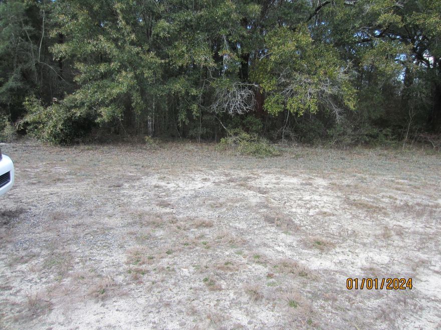 Commercial 5.64 acres of vacant land across Hwy 90 from the Ponce De Leon Fire Department.  There is approximately 144 feet of frontage on Hwy 90. Great location in the quaint and Historic City of Ponce De Leon.  The property designation of commercial allows for retail, various business uses, commercial lodging, professional offices, etc.