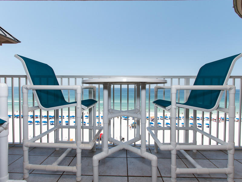 The ''Penthouse'' Suite! Reward yourself on the quiet top floor with breathtaking views of the beach and gulf. Master Bedroom has a full beach view and opens to a private patio. Awesome views from this condo!Complex features a heated pool, hot tub, fitness room, and a BBQ area. Beach Service is included in the HOA! Covered parking spot conveys with this condo.