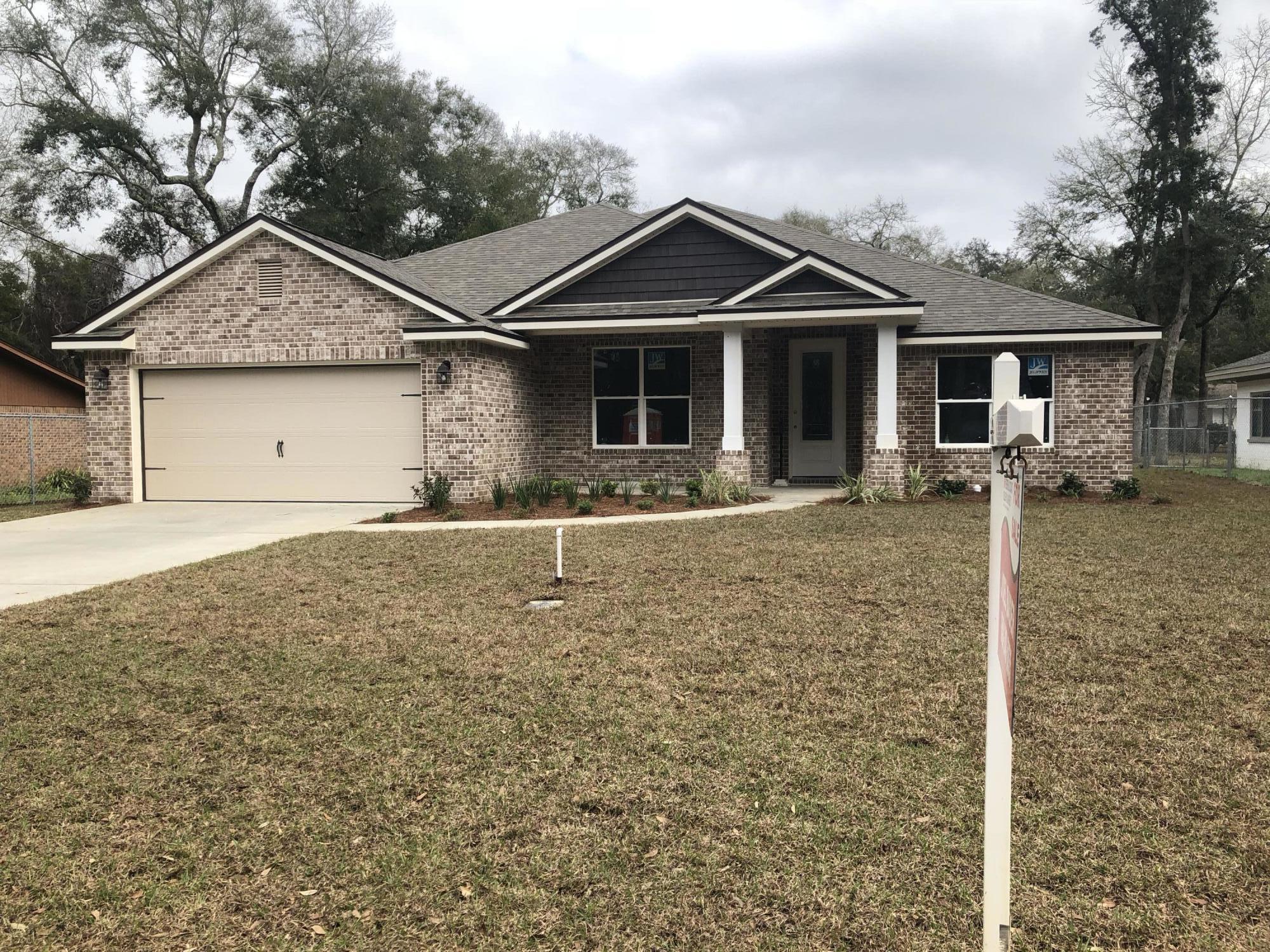 ESTIMATED COMPLETION: mid-March... Split BR plan - Open Floor Plan - Front & Rear Porches - Privacy fenced back yard - Waterfront properties across the street. Huge LR opens to the kitchen at one end & door to rear porch at opposite end. Pendant lights over large breakfast bar. Kitchen has recessed ceiling lights, all stainless appliances, granite tops, self closing cabinet drawers, crown molding. DR focal is the high treyed ceiling with crown & a gorgeous chandelier. High baseboards and 2 panel doors painted white contrast beautifully with cream colored walls. Master BR on opposite end of home from other BR's & has treyed ceiling with crown & recessed lighting. All BR's have a smoke detectors, individual return air systems & fan/lights. Master Bath has a separate large .Click ''more'