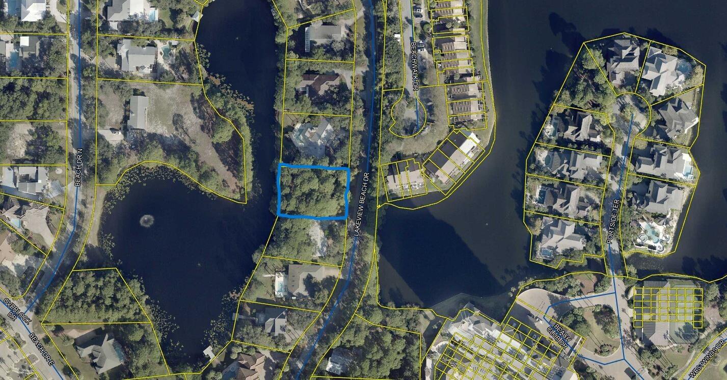 Rare Gulf Pines lake front lot with Gulf views from the third floor. Gulf Pines offers 1400 feet of gorgeous white sand and emrald green water on a private neighborhood beach. Build upto three stories on this beautiful lake front lot.