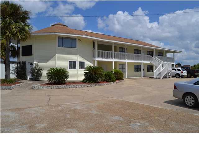 PRICE REDUCED...MAKE AN OFFER..Fantastic Office Building opportunity in the heart of Panama City Beach; location and condition make this property stand out. There are six offices. Located across from Super Wal-Mart off Hutchinson Blvd (Middle Beach Road) makes it also easy access to Panama City and the rest of the beaches. Owner has maintained the property in pristine condition. Location, Condition and Pricing make this a Class A opportunity.