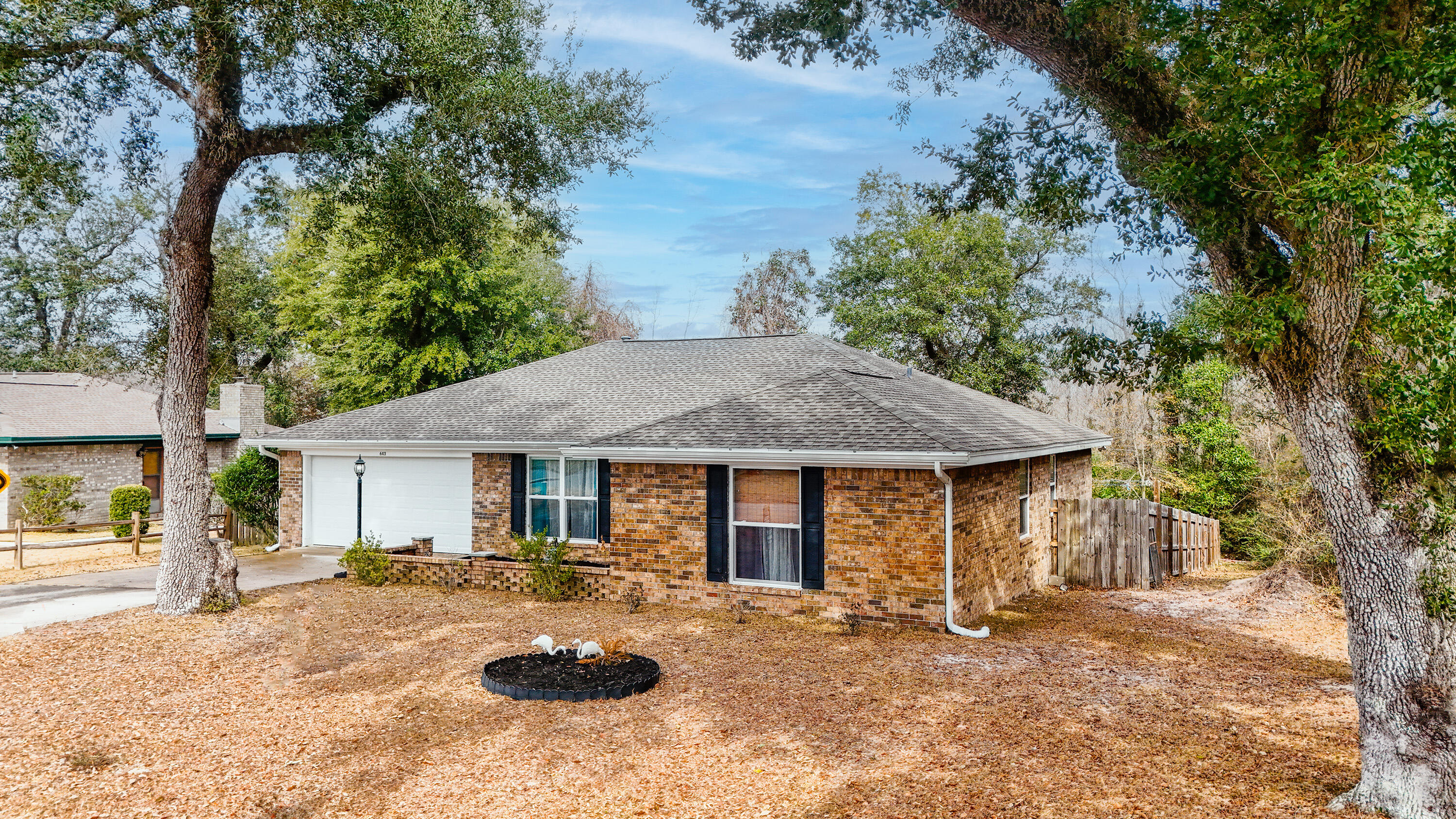 Charming 3-Bedroom Brick Home in Imperial Oaks - Minutes from Tyndall AFB!Welcome to this beautifully maintained 3-bedroom, 2-bathroom all-brick home in the Imperial Oaks subdivision. Conveniently located just 15 minutes from Tyndall Air Force Base and close to shopping, and restaurants, this home offers both comfort and convenience.Step inside to find a spacious formal living room and a welcoming foyer with a large coat closet. The oversized family room features a wood-burning fireplace, and cathedral ceiling, making it the perfect space for relaxing or entertaining. The large kitchen and dining area boasts a gas stove and ample counter and cabinet space for all your cooking needs.All three bedrooms are generously sized with ample closet space, and the hallway includes an oversized linen closet for additional storage. The primary suite is a retreat of its own, featuring double walk-in closets, and a vanity dressing area with a mirror.

Situated on a spacious 0.32-acre lot, this home offers a large fenced-in backyard that backs up to a serene wooded area. Enjoy your morning coffee on the back deck, taking in the beautiful sunrise and peaceful sounds of nature.

Recent updates include Roof, HVAC, garage door, windows, and French doors - all replaced within the last 6 years.
Chimney sealed & crown coating with a 10-year warranty, new fireplace damper, new gutters (front & back) with rain barrel drainage system

With only one neighbor to the side, this home offers a rare sense of privacy and tranquility. Whether you're starting a family, upgrading your space, or looking for a peaceful retreat, this home is the perfect fit.
Schedule your showing today!
Measurements are approximate, please measure if important.