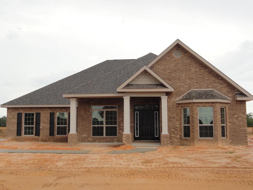 The McKenzie floor plan is a favorite! An open floor plan, complete with five bedrooms. Wide foyer and hallway lead to a spacious area with a double trey ceiling in the living room. Granite countertops and stainless steel appliances show off this beautiful open kitchen that will take your breath away. A large, open, covered porch built within the standard plan allows for grilling and entertaining. The master bath has a large walk in closet, tile shower, raised double vanity and garden tub. It is a must see! Listing Broker/Salesperson has ownership interest in the property. Photos may be of similar, but not necessarily of subject property.