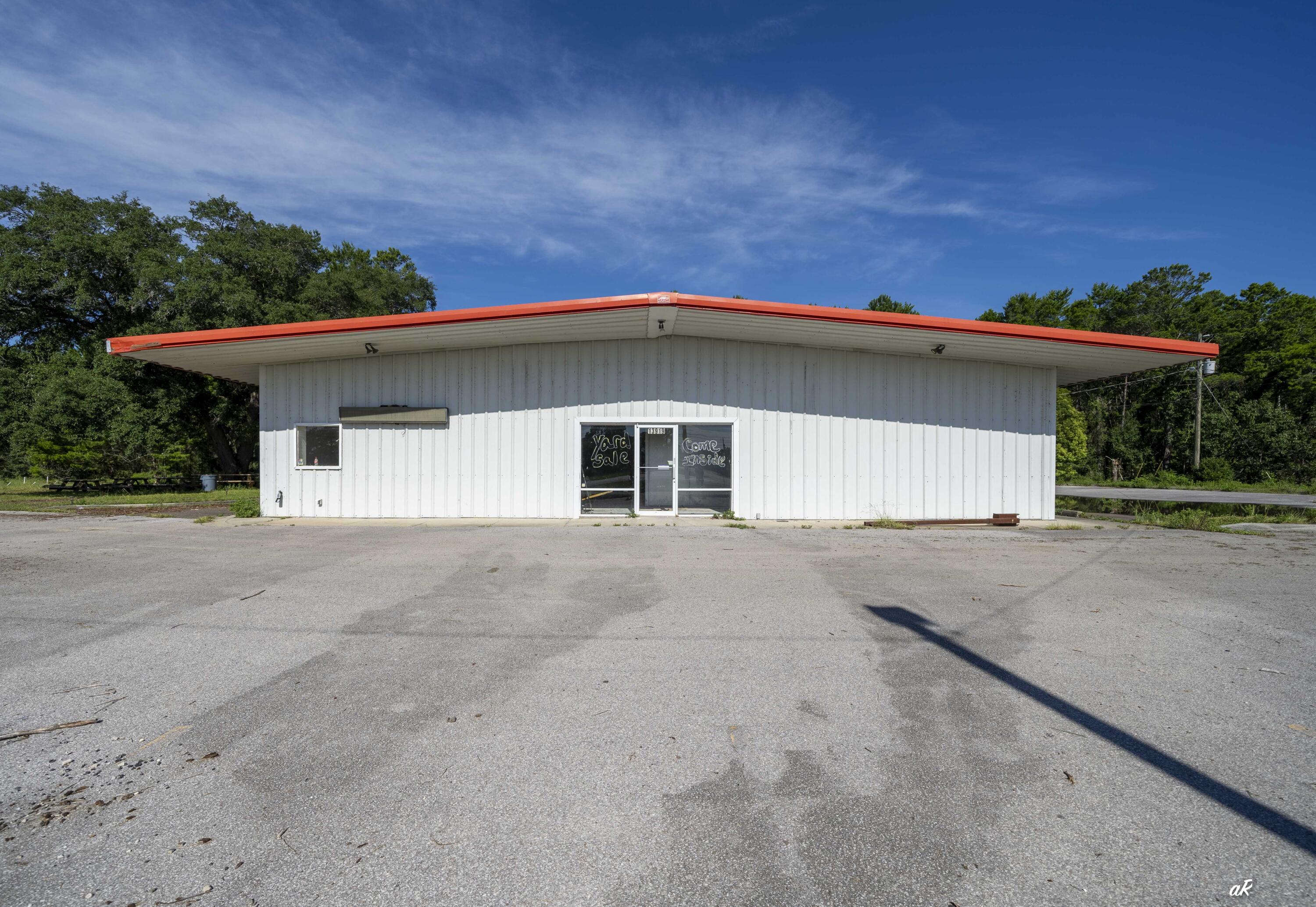 Commercial opportunity, Hwy 77, growth is here, and more business and residents are moving to North Bay County. Fantastic opportunity to own a metal / steel, building, 1.24 acres on Hwy 77. 15,000+ Traffic count and growing each year.