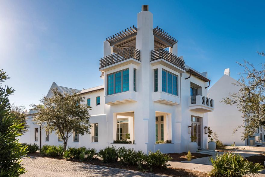 This newly constructed home designed by renowned architect firm, Khoury-Vogt Architects, located on the Beachside of Alys Beach, presents 4 bedrooms, 4 baths and 2 half baths. An elevated kitchen overlooks the spacious open dining and living space, which is equipped with folding doors that open to a gracious courtyard, with a pool and summer kitchen. A two-car garage provides valued parking and storage. The second floor offers two master suites, one with a second floor laundry. There are two additional guest bedrooms and baths with a bunk room on the second floor. A rooftop terrace with fireplace delivers east and west views down Scenic Highway 30A and the rooftops of Alys Beach.