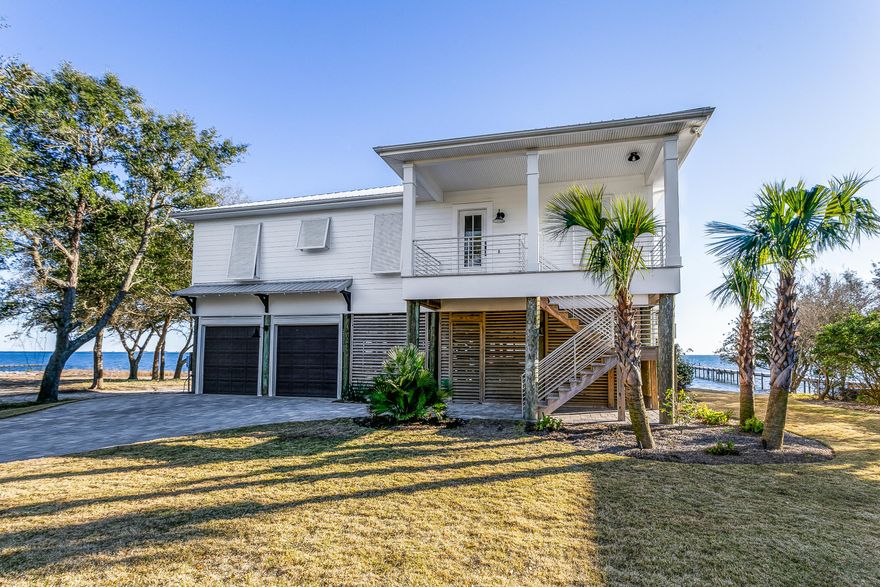Originally built by Old South Construction in 2007, this beautiful waterfront move-in ready home has been completely renovated in 2021 and 2022. Nestled at the end of Sabine Ct, the home offers unobstructed views of the Santa Rosa Sound and the Gulf Islands National Seashore just beyond from the main living area. The interior of the home has been fully updated with virtually every surface touched in some way including new lighting, flooring, paint, cabinetry, new high-end commercial grade appliances, custom master bathroom with bidet, and two new tankless water heaters servicing each side of the home. The list goes on. Exterior features include impact rated windows (140mph) with Bahama shutters, a brand new metal roof, new dock with boat lift, new entry doors, exterior paint, composite decking, tiled patio area with swing on the ground floor, beautiful new paver driveway, and a complete re-work of the grounds surrounding the home replete with electronic dog fencing and sprinkler system. This stunning property will not last long. Be sure to schedule your private showing today.