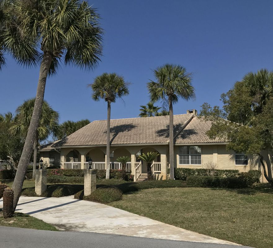 Owner is PCSing and this home is priced to sell! Beautifully situated spacious home with a pool, huge fenced corner lot and views of Santa Rosa Sound from the front porch, nestled among 37 swaying palms. Open floorplan with lots of natural light. Oversized garage and plenty of overflow parking for entertaining. Kitchen has granite island and new appliances installed within the last two years. Natural gas heat and dual water heaters, gas stove, gas fireplace. Plenty of interior storage. This home has been upgraded with a ''clean space'' under the floor with self-regulating dehumidifier to keep out moisture, mold and critters. Deeded beach access with brick BBQ grills within the subdivision available to owners and guests for a low annual assessment fee. Less than 10 minutes west of Hurlburt.