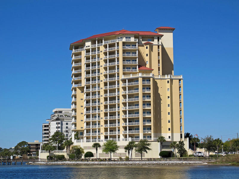 Exceptional End unit at the Presidio Yacht Club. Only the end units have windows to the outside in ALL of the bedrooms, plus an extra balcony on the North Side. Fabulous views of the Santa Rosa Sound and the Gulf of Mexico. This unit offers a breathtaking panoramic water view from the moment you step inside. The wrap around balcony overlooking the Gulf is the perfect place for outdoor living. The Presidio is just minutes away from restaurants and shopping in downtown Fort Walton Beach.This 3 bedroom, 3 full-bath residence has newer appliances and has had a new water heater and new HVAC unit installed. Only the end units have natural light and a view from windows in ALL 3 bedrooms and a dedicated laundry room. Furniture negotiable. Sales price INCLUDES a 43' boat slip on the West Dock