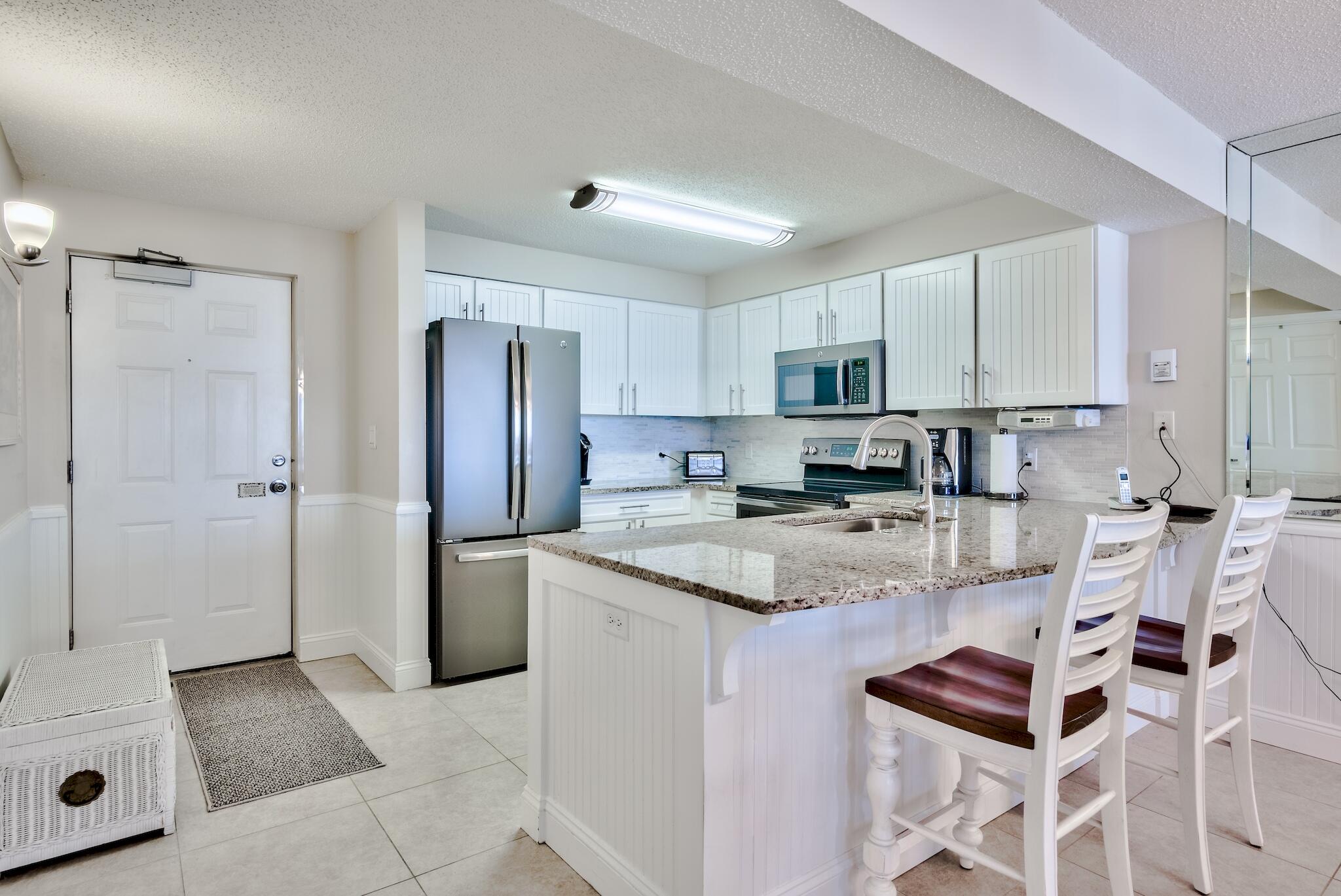 The Sweet spot in the building-7th fl. Unit is furnished and completely updated to include custom plantation shutters, kitchen with granite, upgraded stainless steel appliances, cottage doors, large neutral tile throughout, updated vanities, toilets, and gorgeous tiled showers with glass doors. If you want a unit that is turn-key ready this is it! Amenities include tennis, 3 pools, one is new, a 114 ft. zero entry on beach that also has a new 12 seat spa, game room, gym, spa, sauna, tiki bar, cafe and large community room. Call Broker to see. There is an assessment coming for waterproofing and painting the building. The proposed amount for the assessment is 6818.00. Payments due 20th of Sept and 20th of October per HOA.