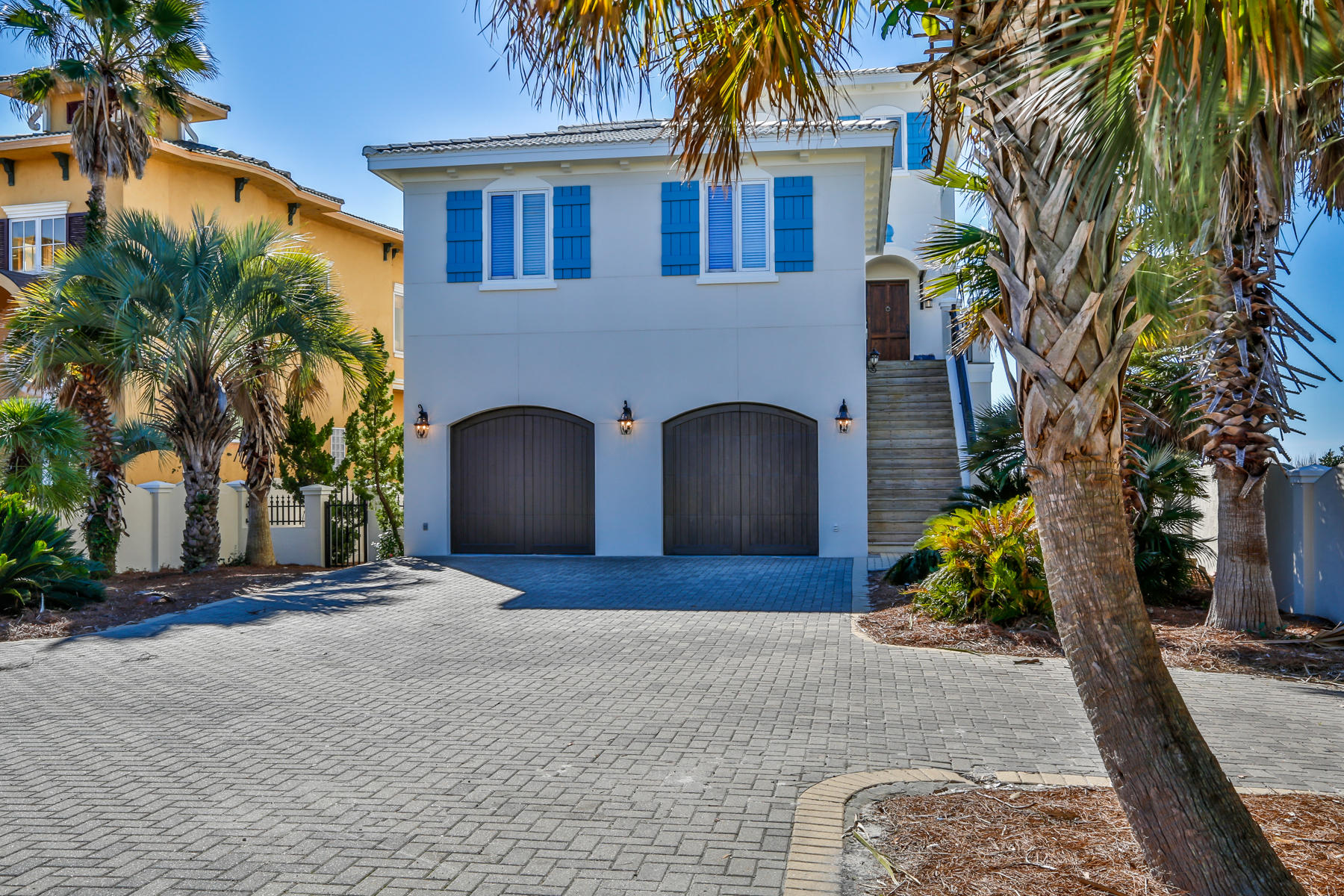 NEW RENOVATION AND PAINT THROUGHOUT.... STUNNING GULF FRONT .....IN SANTA ROSA BEACH...! SEAS THE DAY is a fabulous property and is just a few doors down from the Santa Rosa Golf and Beach Club and Gulf Place for dining and shopping. Entering through the 250 year old antique front door, one can feel the casual elegance of beach living, combined with westerly sunset views. This home, designed with entertaining in mind, invites you to take off your shoes and relax. Located on a high bluff and nestled in the heart of Old Dune Allen, this home is the result of much attention and devoted to fine beach living. Wooden doors, natural pine wood floors, Mexican tile, stained glass transoms, a shell designed powder room and a very private courtyard pool...says ''we can enjoy ourselves here.