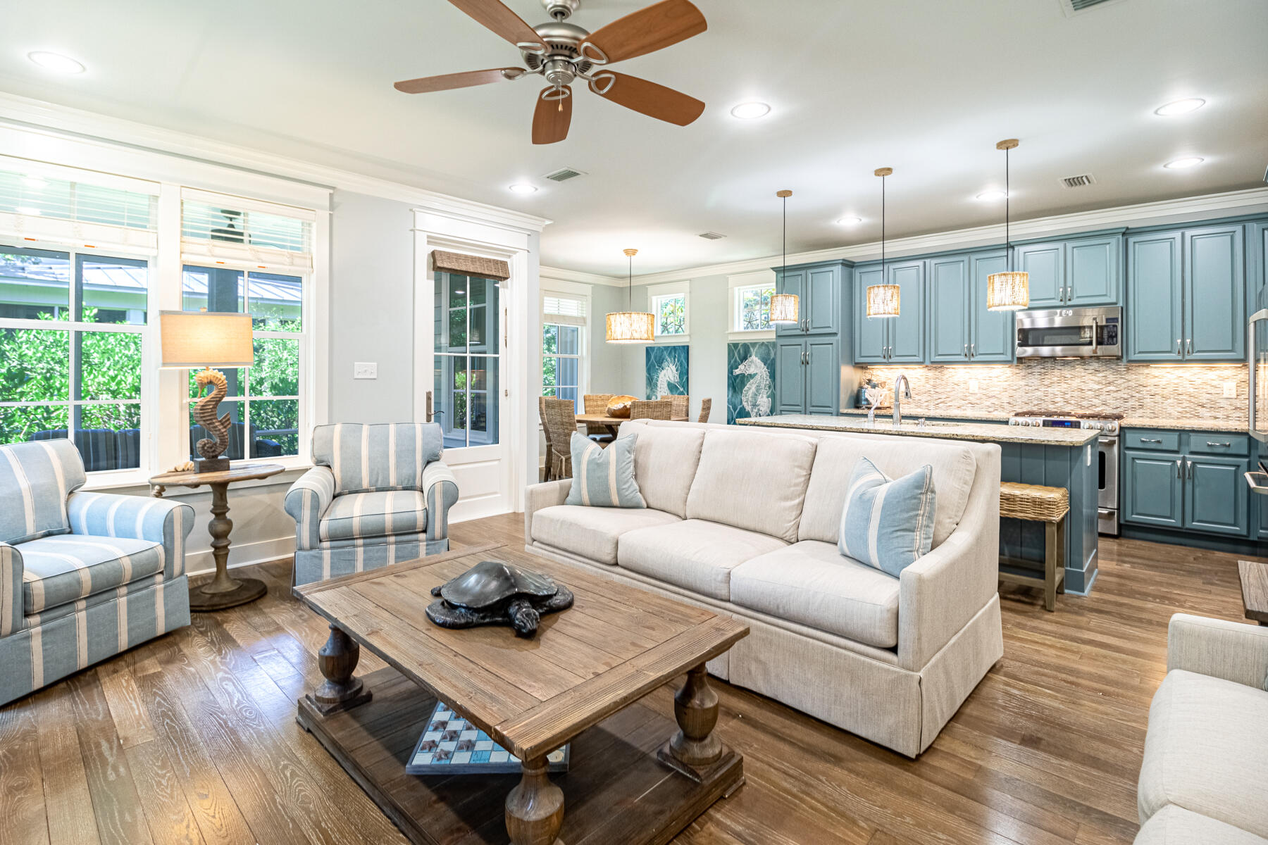 This charming and impeccably maintained cottage in beautiful Watersound West Beach would be ideal as a primary, second home or investment rental property. The home is offered fully furnished and sleeps eleven offering; 2 master suites, an additional guest room, custom-built cozy hall bunk beds with a twin over a queen and a second floor bonus area that is converted into a bedroom but could be used as a second living or entertainment area. Large windows introduce abundant natural light into the living room which opens onto a lovely screened porch and into the spacious chef's kitchen with extended cabinetry, stainless steel appliances, granite countertops and a 5 burner gas stove. The first floor is complete with a powder bath, one of the two master suites and a full size laundry room...