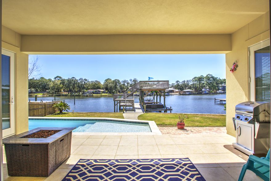UNDER CONTRACT w/ Contingencies. ACCEPTING BACK-UP OFFERS. Incredible Waterfront home with deep water! 5-bedroom Custom Home built in 2003 with 75 feet on the water. This home offers Serenity and Peace with Amazing Waterviews along with a spacious open concept main floor for entertaining. The First Floor has 10 Foot Ceilings, Crown Molding, Recessed Lighting, 7'' Baseboard and Porcelain Tile Flooring. The Kitchen features NEW Quartz Countertops and backsplash, Custom Cabinets, Stainless Appliances and Large Walk-In Pantry. Enjoy Phenomenal views of Buck Bayou from your Master Bedroom, Living Room, Kitchen/Dining and 3 of the upstairs bedrooms including the Office. The Heated Pool can be controlled by an iPhone or iPad includes Hayward Pool Lights, Waterfall, Massage Jets,