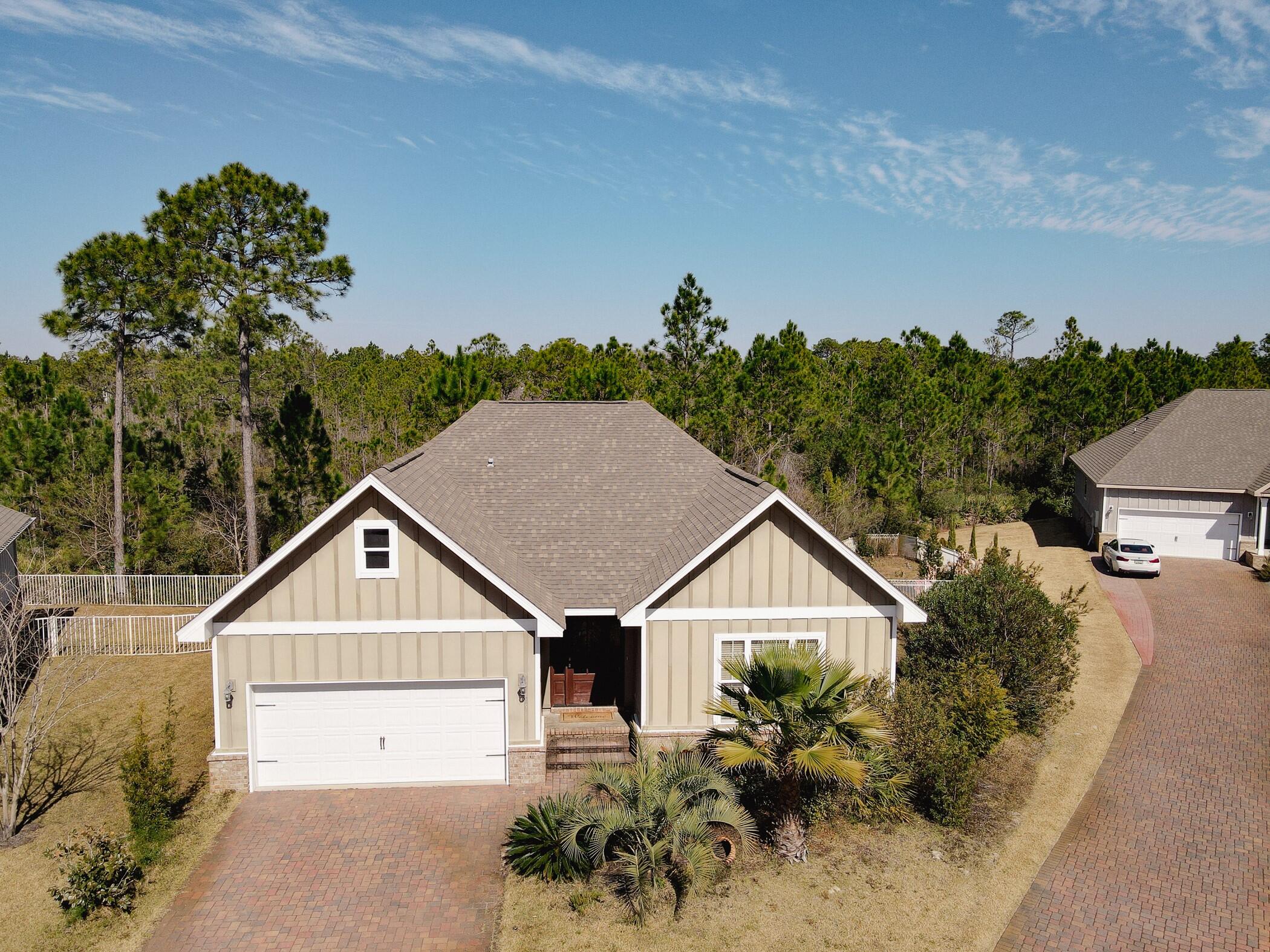 Perfect investment property, second home or primary residence in the beautiful, gated neighborhood, Cypress Breeze Plantation! Behind the gates of Cypress Breeze Plantation sits this perfectly situated , 3/2 home with a large yard and expansive views of the nature preserve behind it! Cypress Breeze Plantation is known for its magnificent 3-tiered lagoon- style pool with waterfalls, fountains and a spacious sundeck, along with the convenience of being only a short walk to the sugar white sand and crystal clear emerald waters. A walking path allows easy access to the beach and all the local favorites, including Shunk Gulley Oyster Bar and the colorful community, Gulf Place, where you can eat, shop & play. Don't miss out on this incredible opportunity to own a piece of the 30A area!