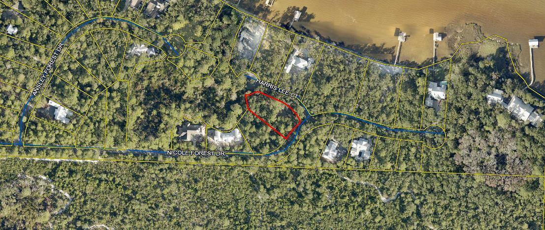 Beautifully wooded lot in secluded Estuary development located off the Bay with 39 elusive home sites. This lot is over 1/2 acre in flood zone X, across the street from the Bay. Gated community has an intimate setting with single road access through Point Washington State Park. Build your dream home in this natural and private enclave.