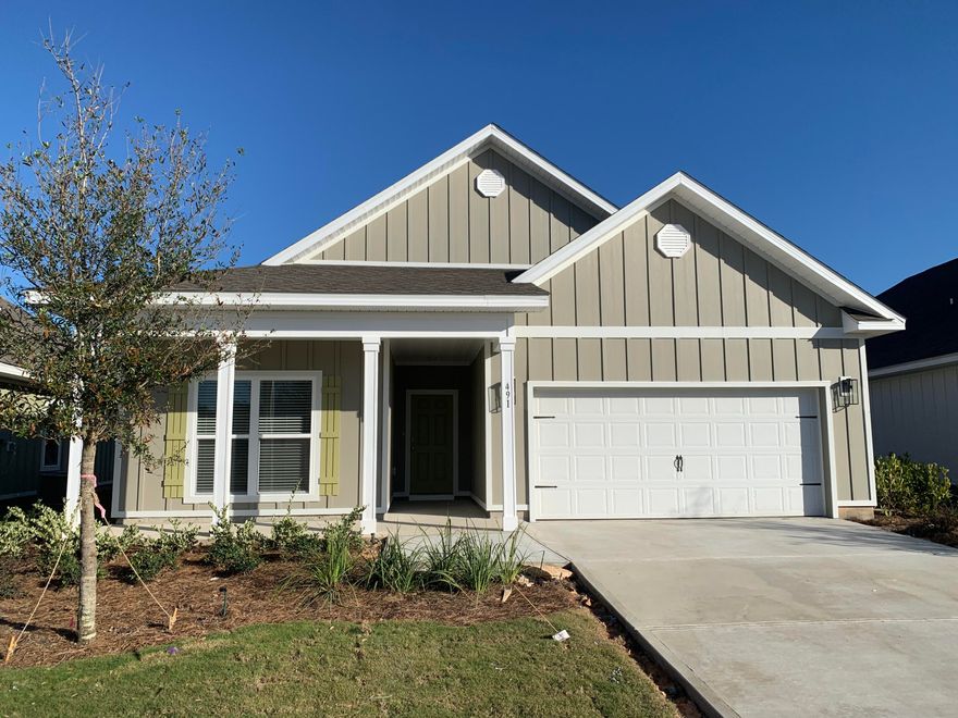 Welcome to your lovely home in the beautiful Hammock Bay community! This delightful 3 bedroom, 2 bath residence features elegant 9' ceilings, EVP flooring throughout the common areas, and cozy carpet in the bedrooms. You'll love the modern stainless steel appliances, and the convenience of a washer and dryer, all with fresh new paint! Enjoy the perks of lawn care, Directv, and garbage collection included. Embrace the vibrant community with multiple pools, pickleball, tennis and basketball courts, plus plenty of scenic walking trails to explore. Don't miss out - see it today, it won't last long! Just a friendly reminder, no pets allowed!