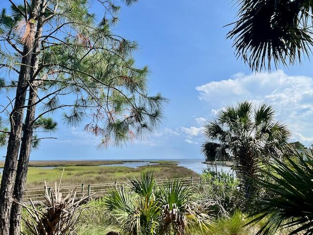 End of the street lot on beautiful Oyster Bay canal, UNBEATABLE water views which will remain unobstructed. Located in Wakulla County in a gated neighborhood with NO HOA. Nearby boat launch. Cleared and potential to build. Access to public water and sewer and already connected to utilities. Must go and see this prime location on Florida's beautiful coast line!