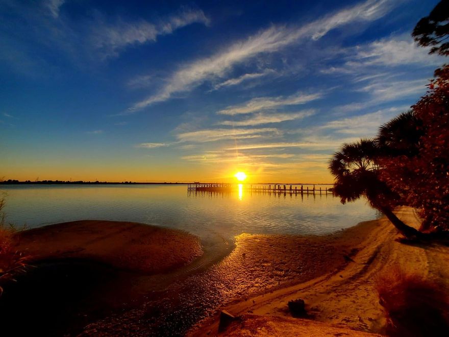 Welcome home to the waterfront community of Fountainhead Condominiums. There is so much to love about living here. From breathtaking sunsets to watching the dolphins swim or evening fishing, there is no shortage of activities to enjoy in this Florida paradise. This one bedroom, one bathroom condo is ready for you to make yourself at home. Enjoy sitting on your back patio overlooking the lush landscaping and tennis courts. You are right next to the on-site facilities. Just a short walk to the beach. Amenities include a nicely appointed club house, tennis courts, pool overlooking the sound, beach with kayak and paddle board storage, on-site laundry facility and boat docks. Boat slips are rented on a first come/ first served basis. Boat slips will accommodate vessels up to 24'.