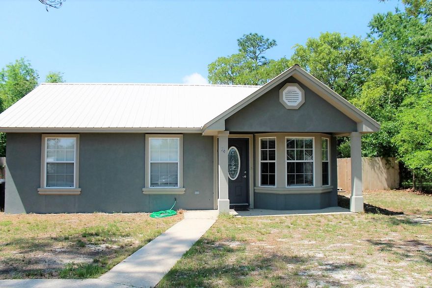 Priced to Sell!! Well maintained 3 Bedroom, 1 Bath home situated on .3 acres is located in close proximity to King Lake Resort. This charming home is complimented with new flooring, newer stainless appliances, new vanity, upgraded light fixtures and metal roof. The Large fenced back yard with storage shed and covered patio. Great rental or starter home!! This home won't last long!! NO HOA FEES!! Back on market because buyers financing fell through.