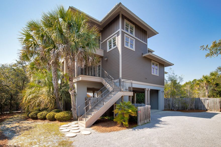 Gorgeous two story 4bdrm 4bath home was built by Steve Dixon and John Kazek in 2004. This 86 lot subdivision is hidden from the public eye and completely surrounded by state parks and the Gulf of Mexico. A huge screened-in back porch overlooks a gigantic heated pool (30x15) that backs up to the state park. Fantastic views and quiet evenings can be spent on the two front covered porches. Sleeps 12 comfortably with spacious tiled common areas and new hardwood floors in all the bedrooms. Covered parking for four, driveway parking for five additional vehicles. Don't miss a great opportunity to own one of the nicest homes in Gulf Trace! Actual rental numbers are in the document section. Sold furnished excluding a few personal pictures. All measurments and dimensions are estimates and buyer