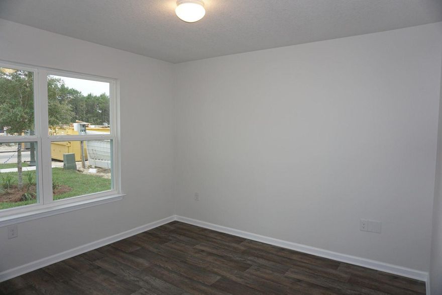 Located in Mill Cottages at Hammock Bay, this new construction 4 bedroom home will check all the boxes on your rental list! This home is a ''Cali'' floorpan by DR Horton. Wood look LVP flooring sweeps through the entire home. The kitchen is open and bright featuring stainless steel appliances and a large pantry. Each bedroom is spacious and has a nice sized closet for storage. The primary bedroom has an en-suite bathroom with both a soaking tub and a walk in shower. Enjoy the outdoors on your covered porch or by taking a stroll to the community general store, dock, playground, or community pool. *Photos are of similar property. Some finishes may vary*