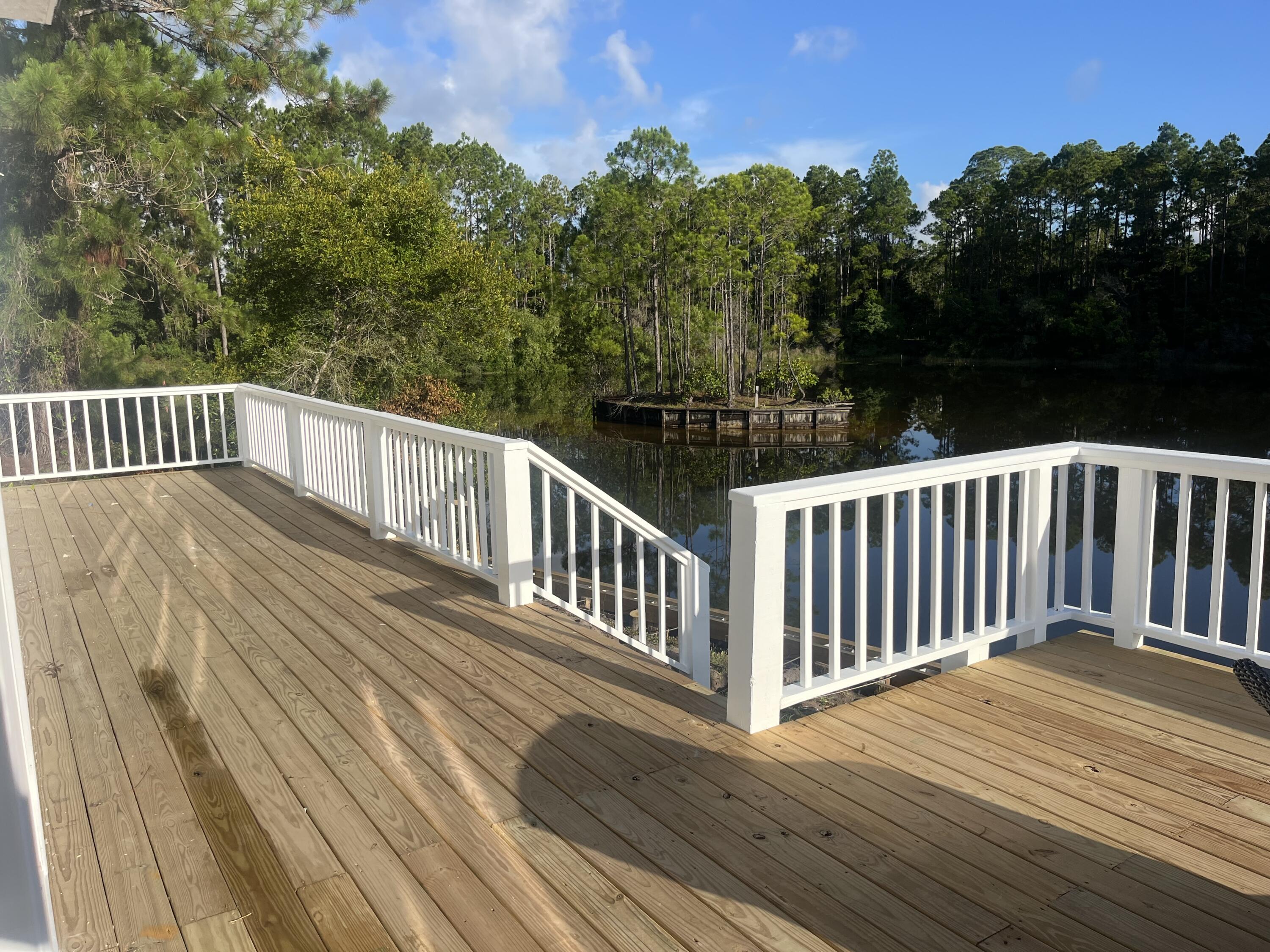 Discover your perfect home with 3 bedrooms, two full bathrooms, ready for occupancy June 23, 2025. The furnished or unfurnished space allows personalization. Ideal for families or those needing a home office, apply now to make this exceptional residence yours!Located in Santa Rosa Beach on a lake in a water ski community South of 98 close to scenic highway 30a, walking distance to Butler Elementary, 30 a through State Forest, shopping, entertainment, the beach. This property boasts ample space in the main living areas and allows plenty of privacy for the bedrooms which are nicely spaced throughout. Separate Mother in law suite also available for an extra fee that can be included in the Long Term rental. Great for those w/ extended families, in laws or wanting a private office.