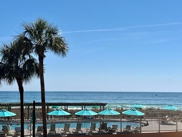 Jetty East is a Gated 6-story midrise with under building parking located on the beautiful sugar sand beach in Destin, Fl. The location is unique as it is located on Holiday Isle (Gulf Shore Drive) which ends at Destin Harbor.  It's great for biking or walking. The jetties of the east pass make a great spot to snorkel or fish from the jetties.   Jetty East is one of the few condos to offer covered parking.  The required Milestone Study and Structural Reserve Study were completed mid-summer. There was an assessment August 1, 2024, for replacing the building sky light.   Unit 117B features an OPEN, INVITING, ELEVATED 1ST FLOOR GULF-VIEW 2 BEDROOM/2 BATH UNIT.  It is conveniently located near the elevator for quick and easy access to the beach or pool.  Updated kitchen countertops and backsplash. The Unit boasts diagonally laid porcelain tile, granite bathroom counters, stainless-steel appliances and crown molding. Master bath has been updated with long vanity.  The breathtaking gulf views are visible from the kitchen, the living room and Master Bath.   Rental Income    2022 $55,000   2023 $53,00 2024 $41,000 The unit features EFCO (category4) sliding glass doors and windows paid for by the seller.  Approximately $25,000 value.  Begin and end each day enjoying spectacular morning views of the Gulf of Mexico. Enjoy evening sunsets and seasonal fireworks from the beach. Great location for shopping, grocery stores (New Publix) and restaurants. Jetty East Amenities: 900 feet of beach, 2400 sq. ft. pool with sun deck, hot tub, beach side pavilion with charcoal grills, tennis courts, pickleball, fitness room, kids' activities, music entertainment, shuffleboard, covered parking, 24-hour security. Nice owners room with full kitchen for meetings or parties.  Financing Note: Jetty is a Non-warrantable/ Condotel.   No conventional (government backed Fannie or Freddie) financing.   Upgrades and Exclusions under Documents 