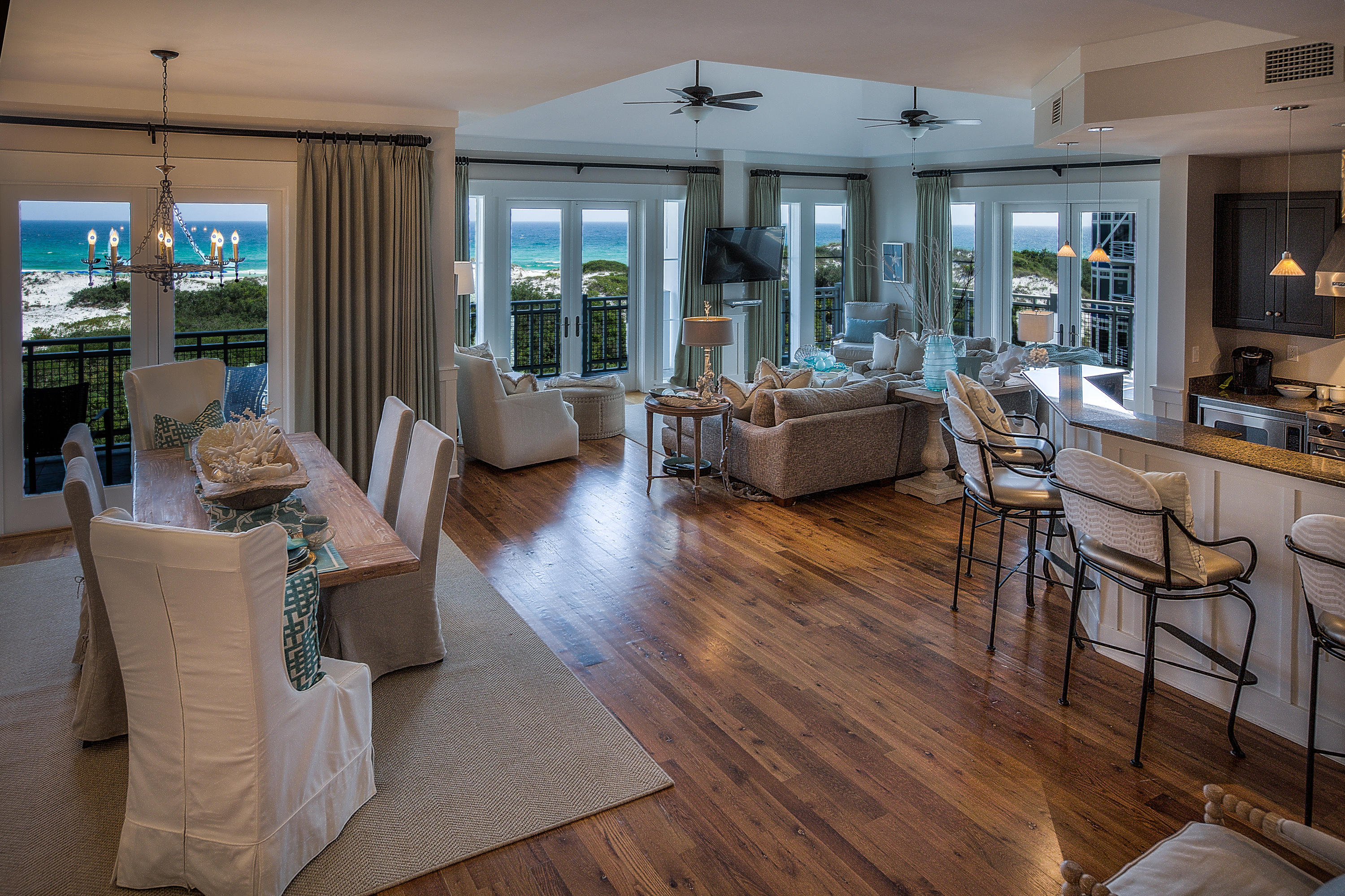The most desired unit located in the magnificent community of Watersound Beach, this gulf front unit can be found on the corner of the to floor of this desired complex. Complete with an expansive wrap-around deck, this condo provides unique views over looking both the dunes and the Gulf. This one story unit includes 4 bedrooms and 4.5 baths at 2,842 square feet, making it the largest condominium floor plan in Watersound!