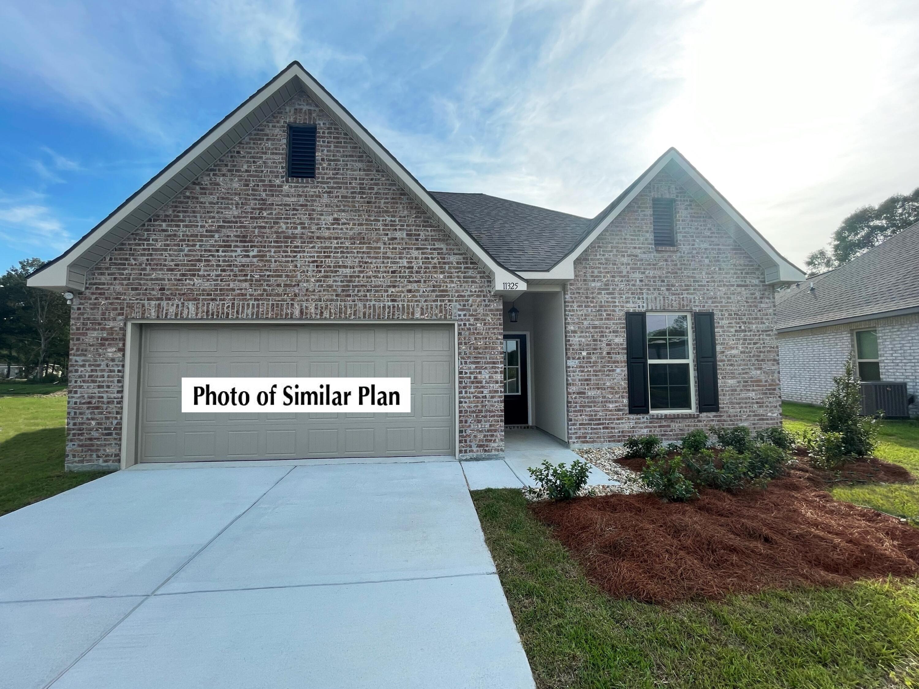 The FALKNER III A in The Bluffs at Lafayette community offers a 4 bedroom, 3 full bathroom open design. Upgrades added (list attached).Special Features: double vanity, garden tub, separate shower, and walk-in closet in master bath, double vanity in 2nd bath, ensuite bath in bed 4, kitchen island, walk-in pantry, covered rear porch, recessed lighting, crown molding, ceiling fans in living and master, framed mirrors, smoke and carbon monoxide detectors, landscaping, architectural 30-year shingles, flood lights, and more!Energy Efficient Features: tankless gas water heater, kitchen appliance package with gas range, vinyl low E windows, and more! Energy Star Partner.
