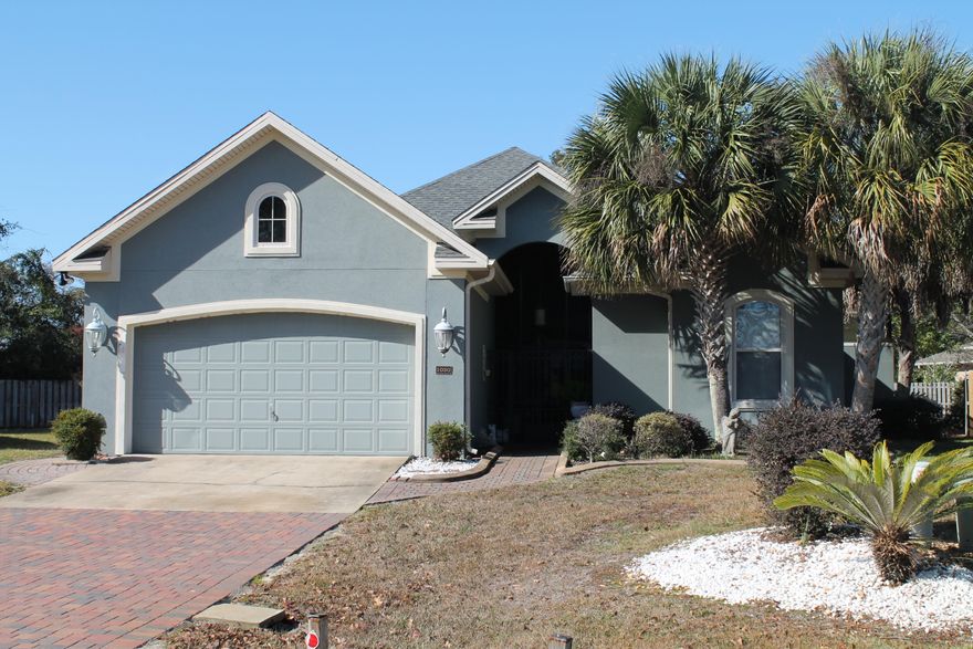 Seller motivated! Welcome home to highly desirable Chardonnay Estates. This 3 bedroom beauty has an office that can me used as a 4th bedroom, along with a seperate guest suite. Step through the front gate into a gorgeous breezeway featuring an in-ground swimming pool with waterfall and a summer kitchen with built in grill. Once inside, your greeted with an open living space with raised 10 ft ceilings, recessed lighting, gorgeous archways and bull-nose corners. Living area sports stunning wood flooring, gas fireplace with lighted niche along with speakers and wiring for surround sound. Kitchen equipped with solid surface countertops, gas stove and built in microwave. All other kitchen appliances do covey. Split floor plan features