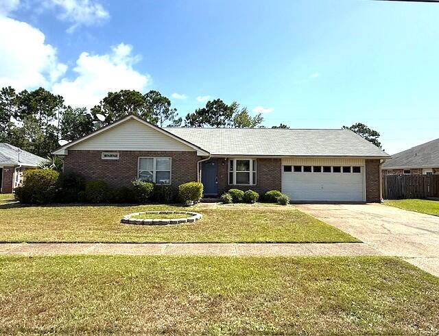 Nestled within the Fox Den Villages subdivision, is this great 3 bedroom, 2 bathroom home boasts a 2 car garage and is conveniently located near shopping and the stunning Navarre Beach. The interior has been freshly painted, and the expansive living room features an remote control electric fireplace. The kitchen features soft-close cabinets and the appliances will remain. A lovely Florida Room offers a serene space for plants and guest to enjoy. Large YARD with privacy fence and electric hookup that was used for an above ground pool. **Hurlburt Base just about 9 miles away** HOME WARRANTY INCLUDED, Water Heater 2019, Roof 2005, HVAC 2023