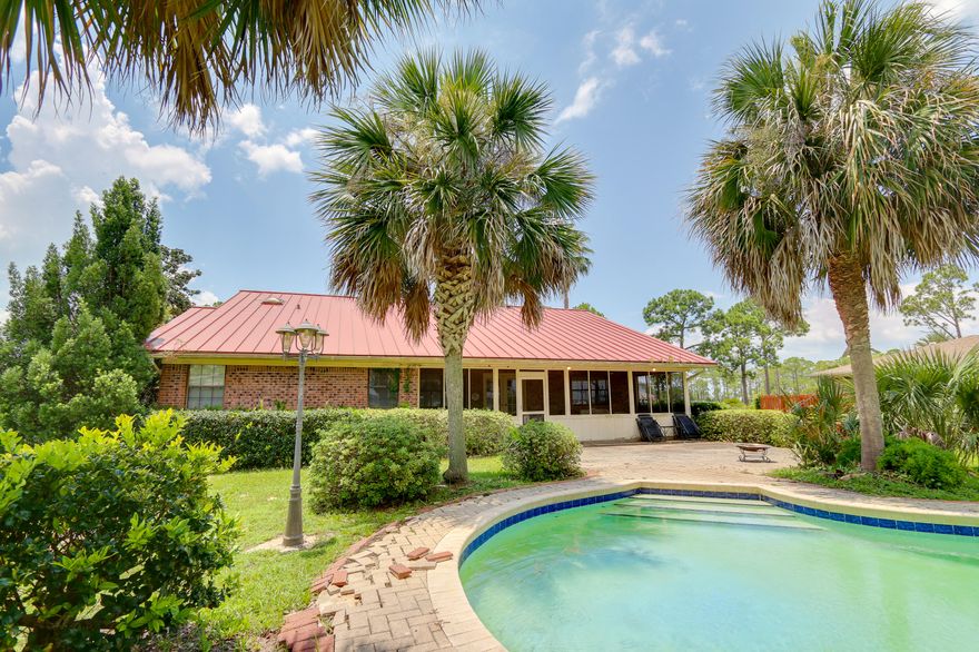 Waterfront brick home with pool in Lynn Haven at the mouth of the Bay with wonderful views. This home features large bedrooms, a great room, formal dining room and eat in kitchen. A large screened porch overlooks the pool and waterview for outdoor dining or entertaining. All new HVAC as of March 2018. Please call your Realtor today to see this home!