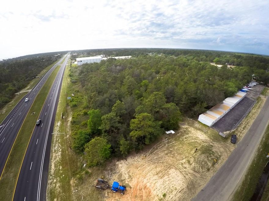 9.7 Acre Square parcel just west of Holly By The Sea, great development property for retail or multi-family, corner location, one of the few parcels left this size in the area, motivated owners