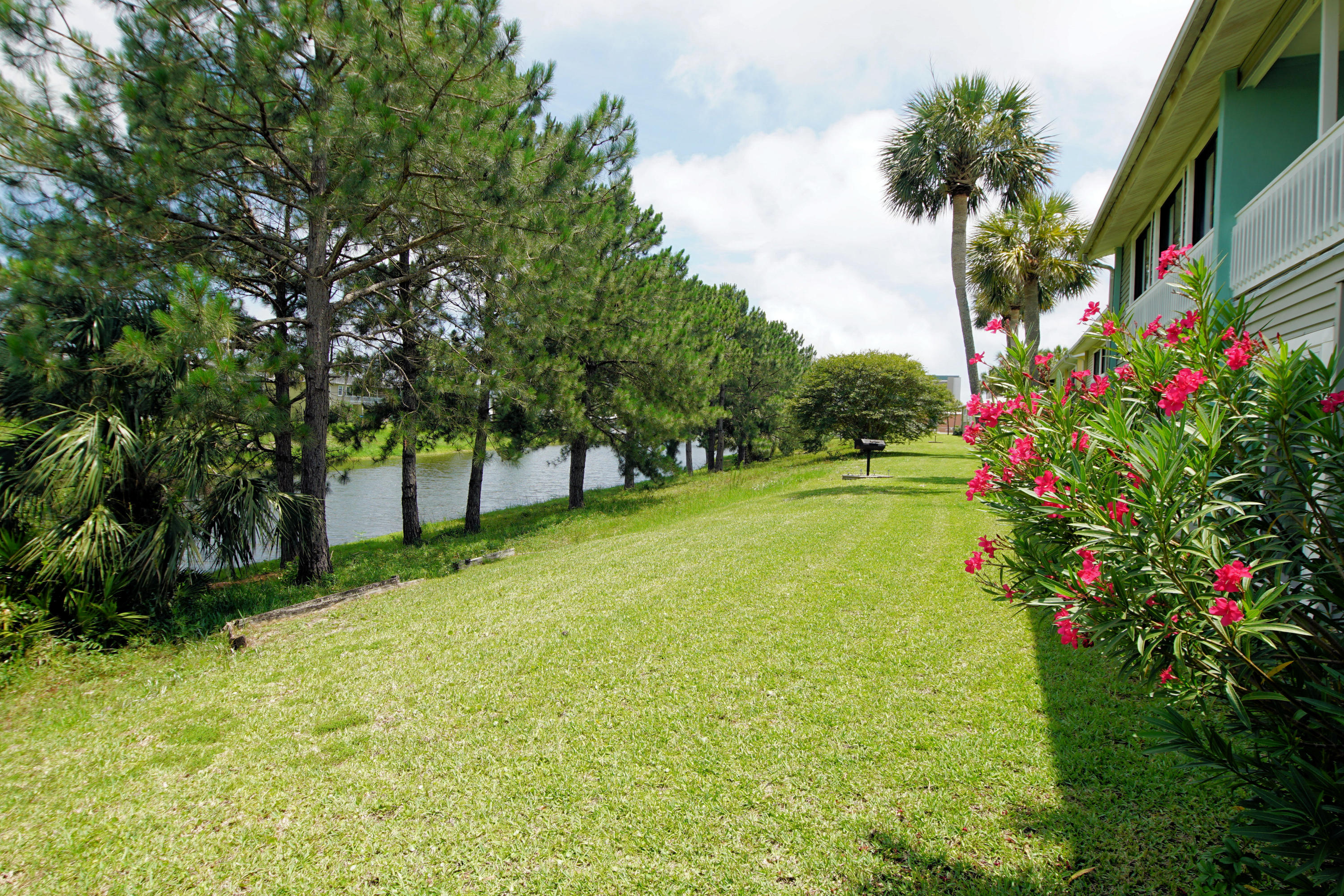 Priced to sell and fully furnished! This 1 bed 1 bath condo is a ground floor, corner unit perfectly situated in the heart of Destin. When entering the gated community the unit is to the left at the very end. Talk about quiet! The Gulf Terrace complex amenities include 3 swimming pools, lake, tennis court, outdoor grills, and community room. Public beaches are within 1 mile of the complex. Very low maintenance needed and would make for a great rental property or a vacation getaway. Call today before this attractive unit is sold!