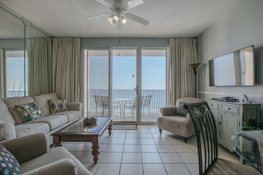 Welcome to Majestic Sun, a beachfront luxury high-rise condominium in the Seascape Resort. With impeccable views of the Gulf of Mexico, revel in this spacious 1 bedroom PLUS bunk(SLEEPS LIKE A 2 BEDROOM!)/ 1.5 bath condo which conveys fully furnished and rental ready. Enter through the front door, conveniently just off the elevator, and your eye is captured down the hallway by the views of the Gulf of Mexico just off the balcony. The hallway is lined with a spacious bunk nook. The bedroom is large enough for a king bed with room to spare. The kitchen, with new appliances as of 2019, is bright and open to the living and dining room. Enjoy this unit, along with the great amenities of Majestic Sun including 2000' of beach, a sparkling, recently renovated indoor/outdoor pool, fitness center,