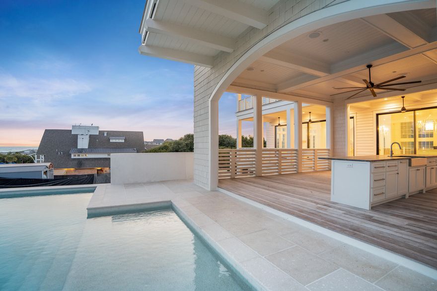 Welcome to 264 Grace Point Way, a breathtaking coastal residence nestled within the exclusive, boutique enclave of Grace Point. Set along Florida's iconic Emerald Coast, this extraordinary home offers the rare blend of refined architectural design, resort-style amenities, and seamless access to the private Watersound Beach Club--creating a lifestyle that is as effortless as it is luxurious.  Encompassing just under 7,400 square feet, this seven-bedroom, nine-bathroom estate has been meticulously crafted to elevate everyday living. Upon entry, you're welcomed by a soaring three-story atrium, awash in natural light and grounded in timeless elegance. This dramatic space offers an immediate sense of grandeur and serenity, establishing the tone for the thoughtfully curated interiors that  follow.  Positioned on the second floor to maximize panoramic Gulf views, the main living area is both expansive and intimate. Walls of glass draw the eye outward toward the horizon, while soft textures and organic materials create a warm, modern ambiance. The open-concept design seamlessly blends living, dining, and culinary spaces, anchored by a gourmet kitchen featuring premium appliances, a generous center island, and finely crafted custom cabinetry. Tucked discreetly behind, a full butler's kitchen adds functionality and ease when hosting, catering, or preparing private meals.  Step through sliding glass doors to one of the home's most spectacular features: an expansive second-level terrace that redefines outdoor living. Designed to capture every Gulf breeze and golden sunset, this private oasis boasts a sparkling pool, a covered lounge area, and a fully equipped outdoor kitchen complete with a built-in grill, bar seating, sink, and refrigeration. Perfect for both quiet mornings and lively evenings, this elevated retreat creates a seamless connection between indoors and out, framed by the sound of the waves and the rhythm of coastal life.  Each of the home's seven bedrooms is a sanctuary of its own, complete with an ensuite bath and serene, private ambiance. The third-floor primary suite offers an exceptional escape complete with an indulgent spa-inspired bath, soaking tub, and oversized walk-in shower. Generous closet space, refined finishes, and Gulf views round out the experience, while several guest suites enjoy private balconies or direct access to the home's outdoor areas providing privacy and luxury for everyone who stays.

Entertainment is central to the home's thoughtful layout, with a media room often referred to as a man cave serving as a welcoming haven for movie nights, game days, or casual gatherings. A dedicated home office provides an elegant and productive space for remote work or quiet reflection. With an elevator servicing all three levels, and two full laundry rooms positioned for convenience, every element of the home has been designed with modern living in mind.
Beyond its stunning interiors, what truly elevates 264 Grace Point Way is its location within one of 30A's most exclusive neighborhoods. Grace Point is a private, gated coastal community where timeless architecture and curated landscaping come together in a peaceful, intimate setting. As one of the very few communities with direct gated access into the Watersound Beach Club, residents with a membership can enjoy a resort-style environment just moments from home. From lazy river pools and private cabanas to exceptional dining, the Beach Club is the heartbeat of this unparalleled lifestyle.  More than just a home, 264 Grace Point Way is a statement of living well. It's a place where refined coastal design meets effortless luxury, where every space invites connection, comfort, and calm. Whether you are seeking a full-time residence, a vacation retreat, or a legacy property for generations to come, this home delivers on every level.
