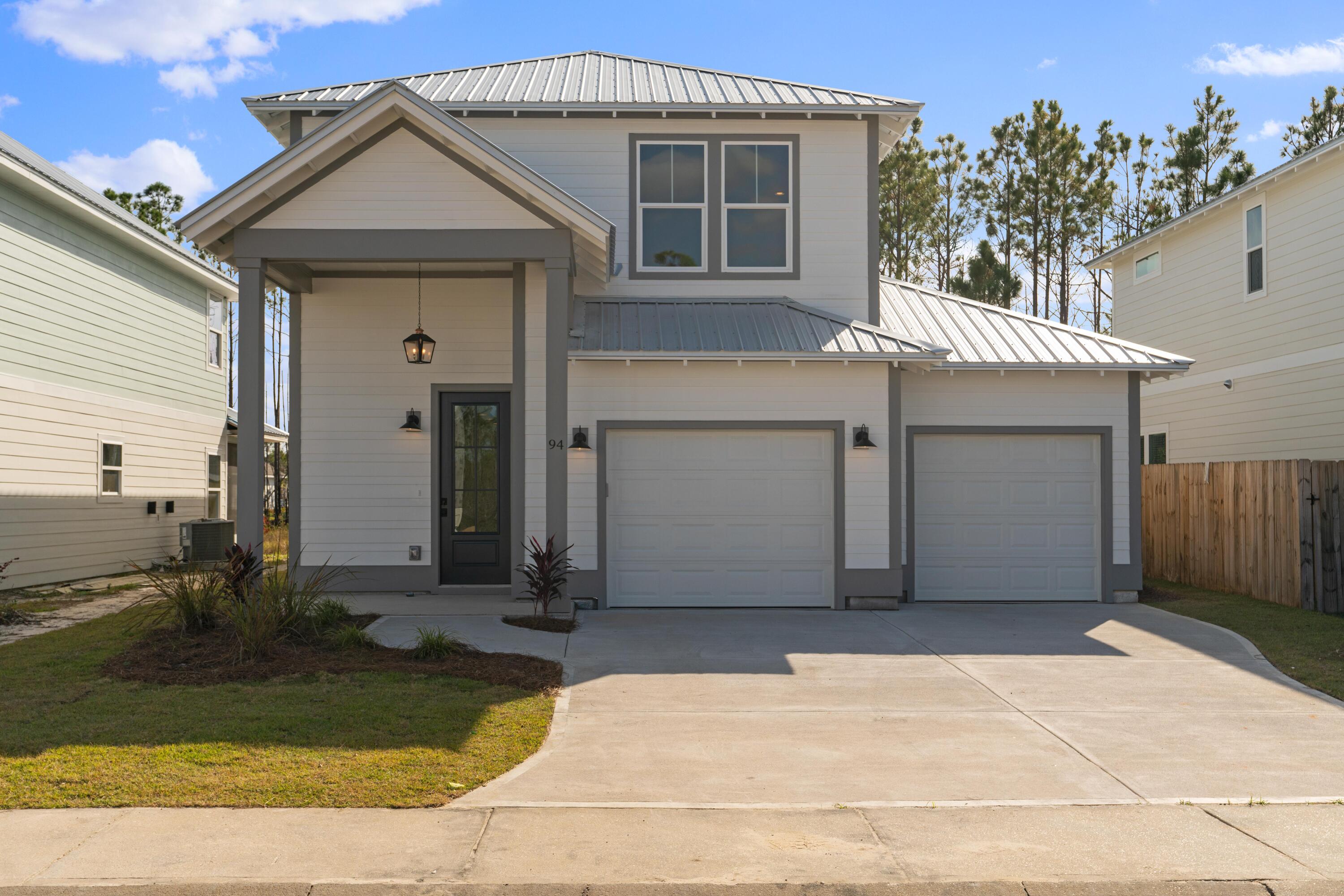 AVAIL: 8/1. *NEGOTIABLE* 6 mo. & 1 day - 12 mo. lease term, furnished POOL home w/ POOL SERVICE INCLUDED. SEC DEP = 1 months rent & can be broken up in 2 monthly installments if qualified. PETS ALLOWED UPON OWNERS APPROVAL & W/ A PET FEE. This newer 2 story home boasts 4 spacious bedrooms, all conveniently located upstairs, & 2.5 bathrooms, including a 1/2 bath downstairs for guests. The master suite is a true retreat w/ 2 walk-in closets & a luxurious bathroom featuring double vanity sinks & a rain head shower. The heart of the home, the kitchen, is a chef's dream w/ quartz countertops, a white apron front farm sink, grey wood cabinets w/ brushed gold pulls, a center island & all stainless steel appliances, including a gas range. The kitchen also features a pantry & a side-by-side fridge w/ ice & water in the door. The home is furnished w/ ceramic tile & LVP flooring throughout, & the 9-foot ceilings add to the spacious feel. The property also includes a 2 car garage w/ an auto opener, a privacy fenced backyard w/ an in-ground pool, a covered front entrance & a covered back patio. The home is equipped w/ a tankless water heater, a sprinkler system & lawn pump, & an inside utility room w/ a storage closet. The exterior features a metal roof & hardiboard siding, adding to the home's durability & curb appeal. 1 mile to the BEACH & a short distance to Butler Elementary! This place is a perfect blend of style, comfort & convenience; welcome home!