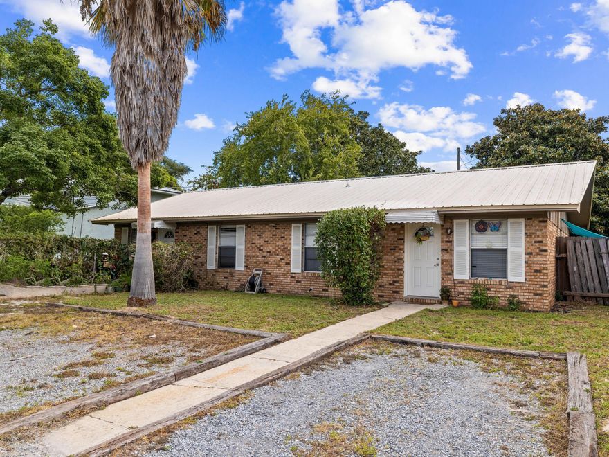This charming four-bedroom, two-bath duplex, located in the desirable Lakeside Villas community, offers 1,664 square feet of comfortable living space. Situated south of Highway 98, this home provides easy bike and golf cart access to the beach, making it an ideal coastal retreat. Perfect for investors, second-home buyers, or those looking for a primary residence with income potential, this property offers the flexibility of both short-term and long-term rentals. The interior features newer paint and tile flooring throughout, creating a fresh and inviting atmosphere. Enjoy the convenience of being close to Pier Park and beach access on the west end of Panama City Beach. This location ensures you're never far from shopping, dining, and entertainment, while still offering the tranquility of a residential neighborhood.
