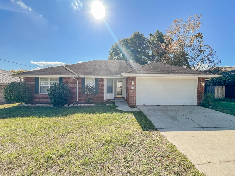 Available 03/07/2025....Easy commute to bases, beaches and shopping. South Crestview convenience. Spacious home lives large. Split floor plan with vaulted ceilings, large bedrooms and bathrooms. Open back patio with plenty of room in the backyard for entertaining. Yard building for lawn equipment. Eat in kitchen area with laminate flooring. 2 car garage and fenced back yard. No inside smoking or vaping. Pets will be allowed with a $400 non-refundable pet fee. Desirable Antioch Estates.