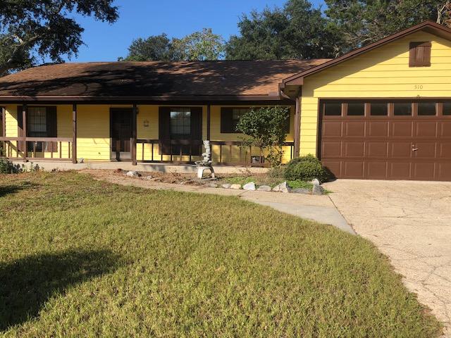 AVAILABLE: 12/17. Pets allowed upon Owners approval & w/ a $250-500 non-refundable pet fee depending on pets. Flexible security deposit = to 1 months rent can be made in 2 monthly installments if qualified. Large sunken living area w/ cathedral ceilings & wood burning fireplace. Kitchen has a dining area w/ all appliances in place, breakfast bar, lots of cabinetry & a pantry. Inside utility room w/ washer & dryer included. Master has a walk in closet. Split bedroom plan for extra privacy. All electric! 2 car garage w/ auto opener, pull down stairs attic storage & a work bench. Covered front porch, screened back patio & open back deck great for relaxing/entertaining. Large fenced backyard! Yard building for extra storage. Desirable Niceville location. Call to see today!