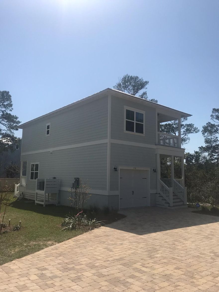 Welcome to Grande Point at Inlet Beach! This beautiful community is tucked away just North of Scenic Highway 30A. This lot is located close to the community pool and clubhouse. This is a Monroe plan. As you enter this home you will find, crown molding and craftsman trim package. The flooring is hardwood in the main living areas and hallways and tile in bathrooms and laundry room. The kitchen is open to the living area and has granite countertops. Appliances include, a stainless steel microwave, dishwasher and gas cooktop stove. This home also has a gas tankless water heater as well as a gas drop for outdoor grilling. Colors and options have been pre-selected. Community pool is located on Lake Powell. Enjoy activities such as kayaking, paddle boarding, and boating activities.