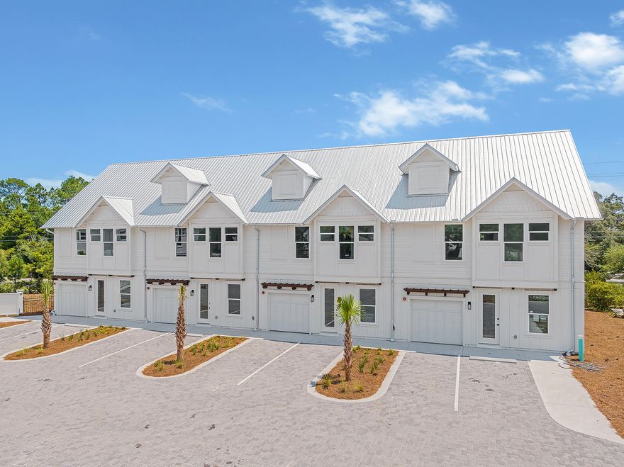 Welcome to the epitome of coastal living! This newly finished construction townhome is a gem nestled within a small boutique community of just 7 units. Boasting 3 spacious bedrooms, 3 and 1/2 baths, additional bunk room area and 1,935 square feet of heated/cooled living space, this residence offers a perfect blend of style and functionality. Inside, you'll be greeted by beautiful hardwood flooring, sleek quartz countertops, and charming wood accent walls that create an inviting atmosphere. The highlight of this home is the covered 3rd-floor outdoor living area, where you can unwind while taking in the serene surroundings. Situated in the tranquil Blue Mountain Beach area, this property offers a respite from the crowds, yet it's conveniently close to Gulf Place, a vibrant hub with fantastic restaurants, shops, an art district, and additional beach access. For those seeking beach days, GulfView Heights provides easy access, and when you're not at the beach, you can relax by the private community pool. Commuting is a breeze with easy access to Highway 98 via Highway 393 and 283. Don't miss out on this coastal haven - schedule your viewing today!
