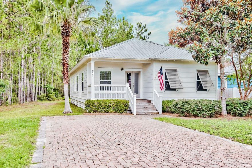 Surrounded by the nature of Point Washington State Forest and only a minute to Hwy. 98, this Florida cottage with Hardie siding and a metal roof is built on a large 1/2 acre lot south of the bay. Only minutes from the beaches of 30A and Destin. A functional floor plan offers 4 bedrooms, 2 full baths with dual vanities in each, and a laundry room. A few of the many upgrades include new stainless appliances, granite countertops, crown molding, wood floors in the living, dining and hall, tile floors in the bathrooms, kitchen, and laundry room. The bathroom showers are tiled to the ceiling. Two of the bedrooms feature walk-in closets. With no HOA, you may also park a boat, trailer or RV on this property. The shops and restaurants of Grand Boulevard, Sandestin Resort, Publix and the hospital